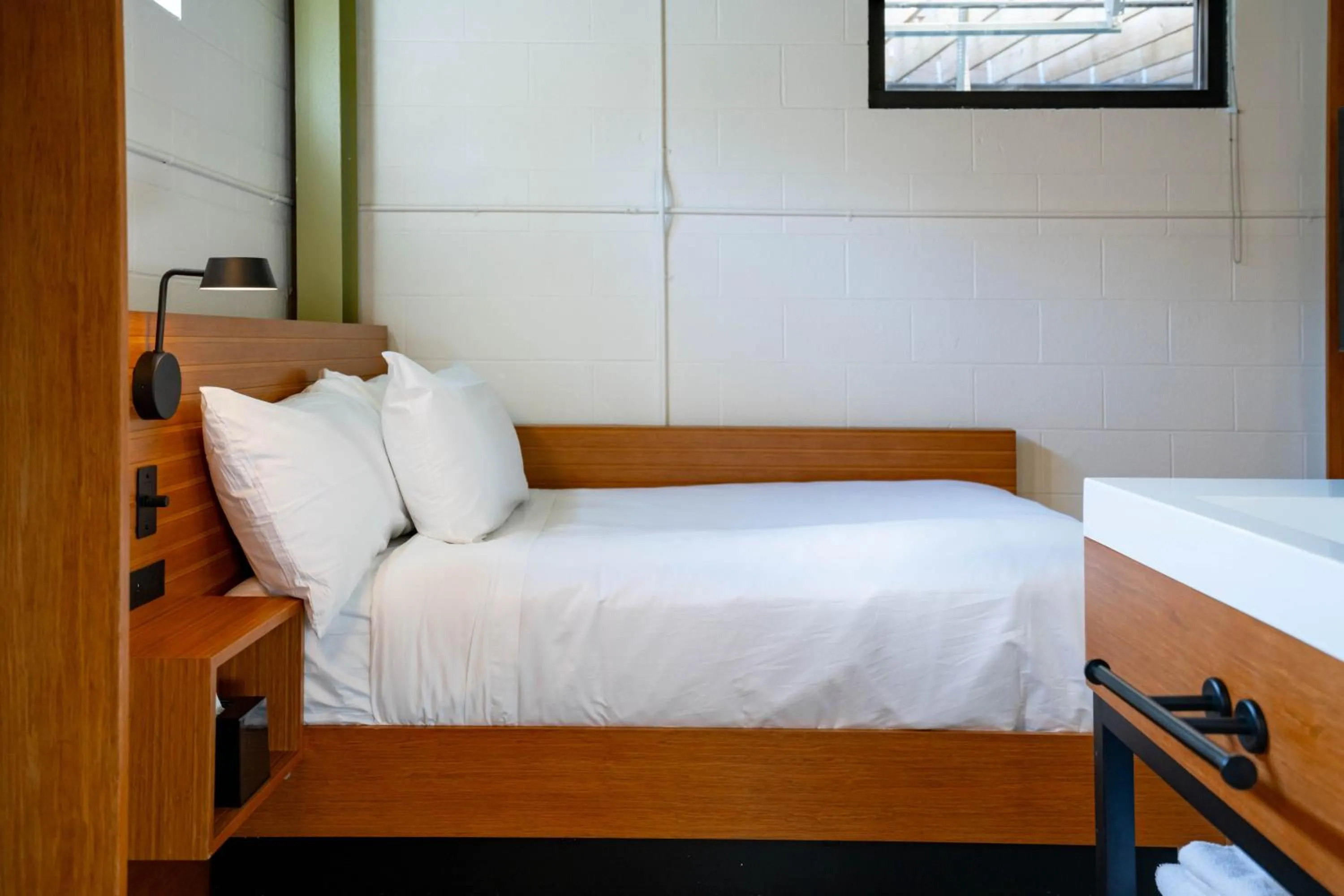 Bed in The Myriad Hotel Louisville, Tapestry Collection by Hilton