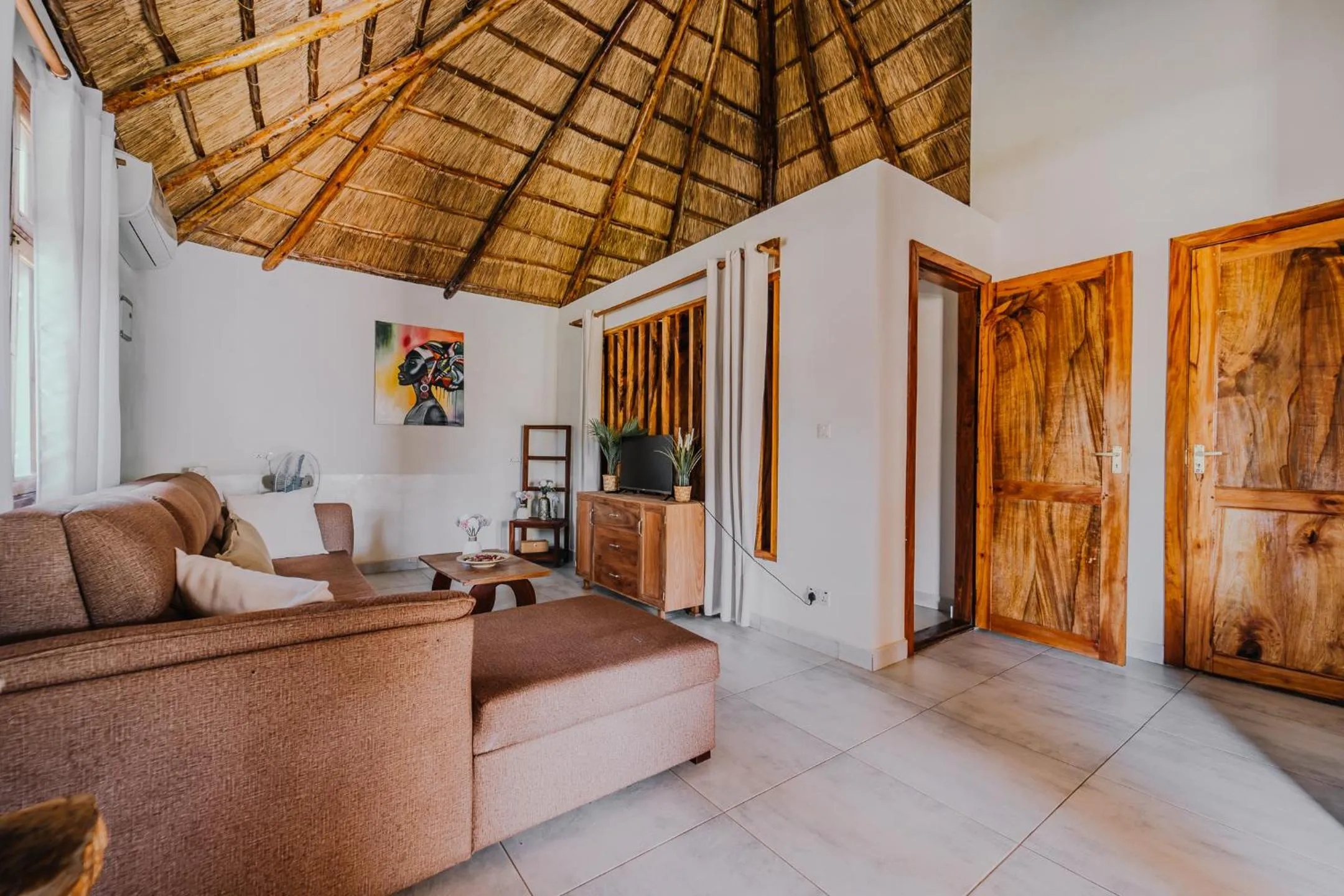 Communal lounge/ TV room in Zaria Garden Bungalows