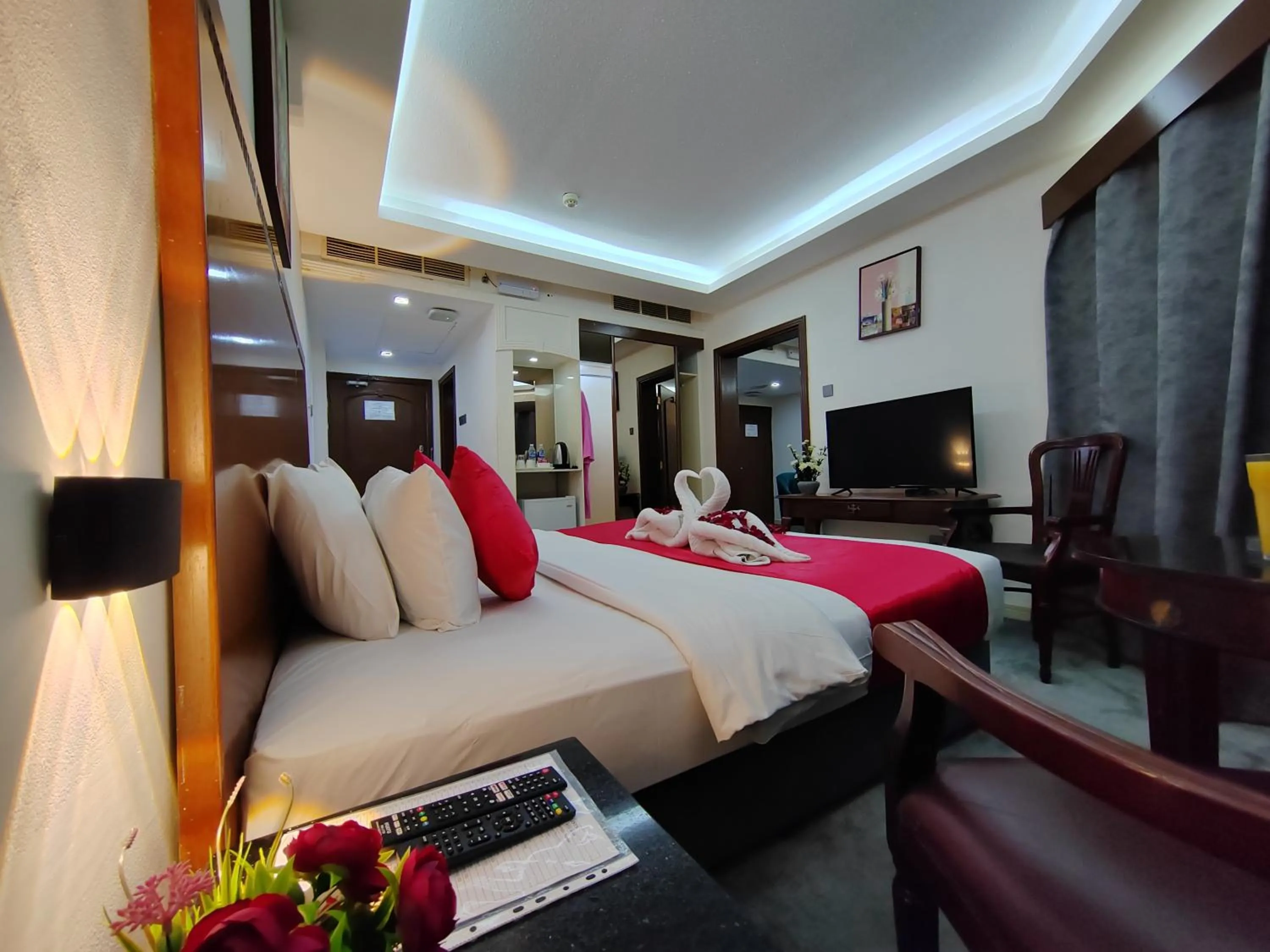 Communal lounge/ TV room, Bed in Le Paradise Palace Hotel Deira Dubai Al Rigga