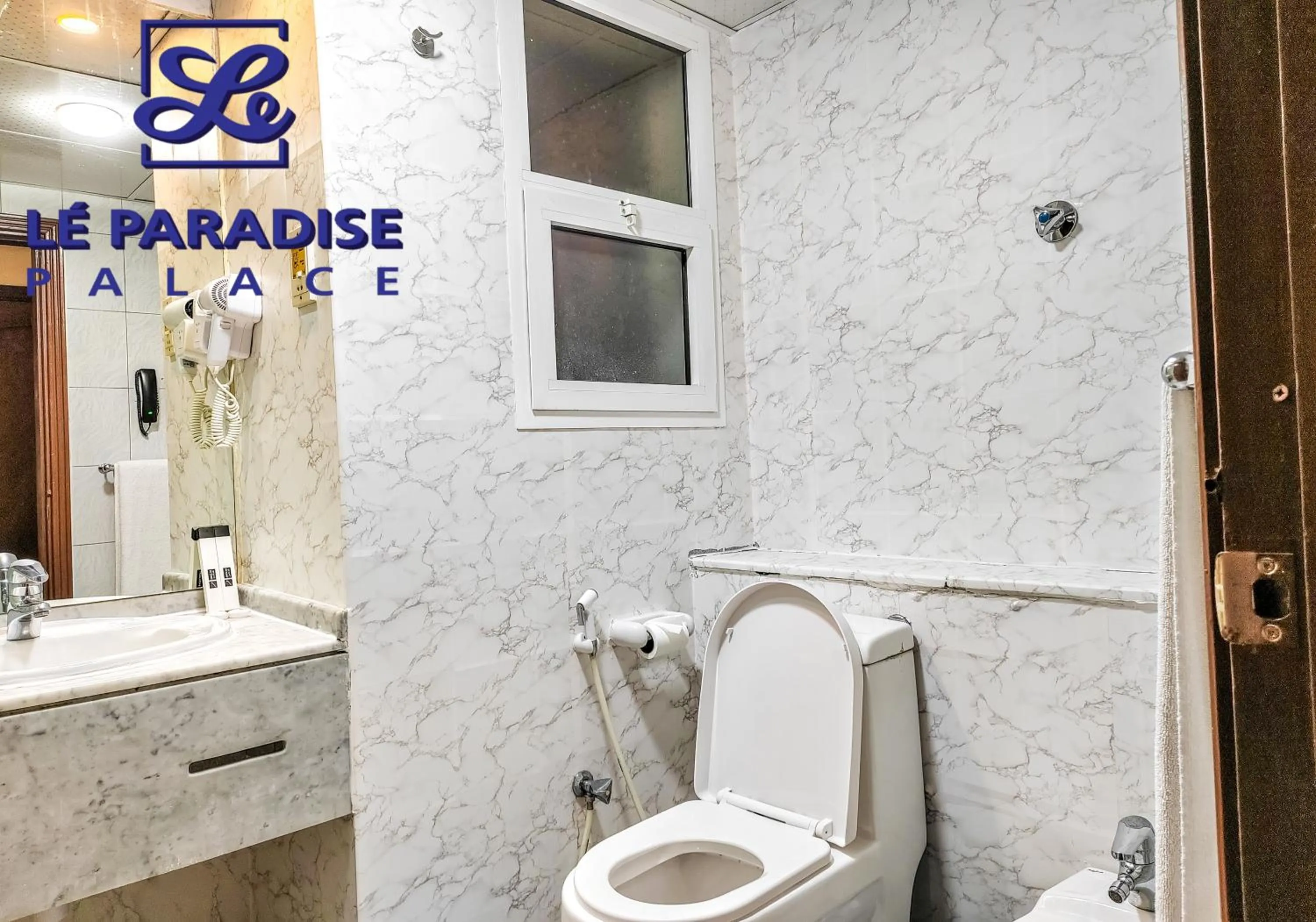 Toilet in Le Paradise Palace Hotel Deira Dubai Al Rigga