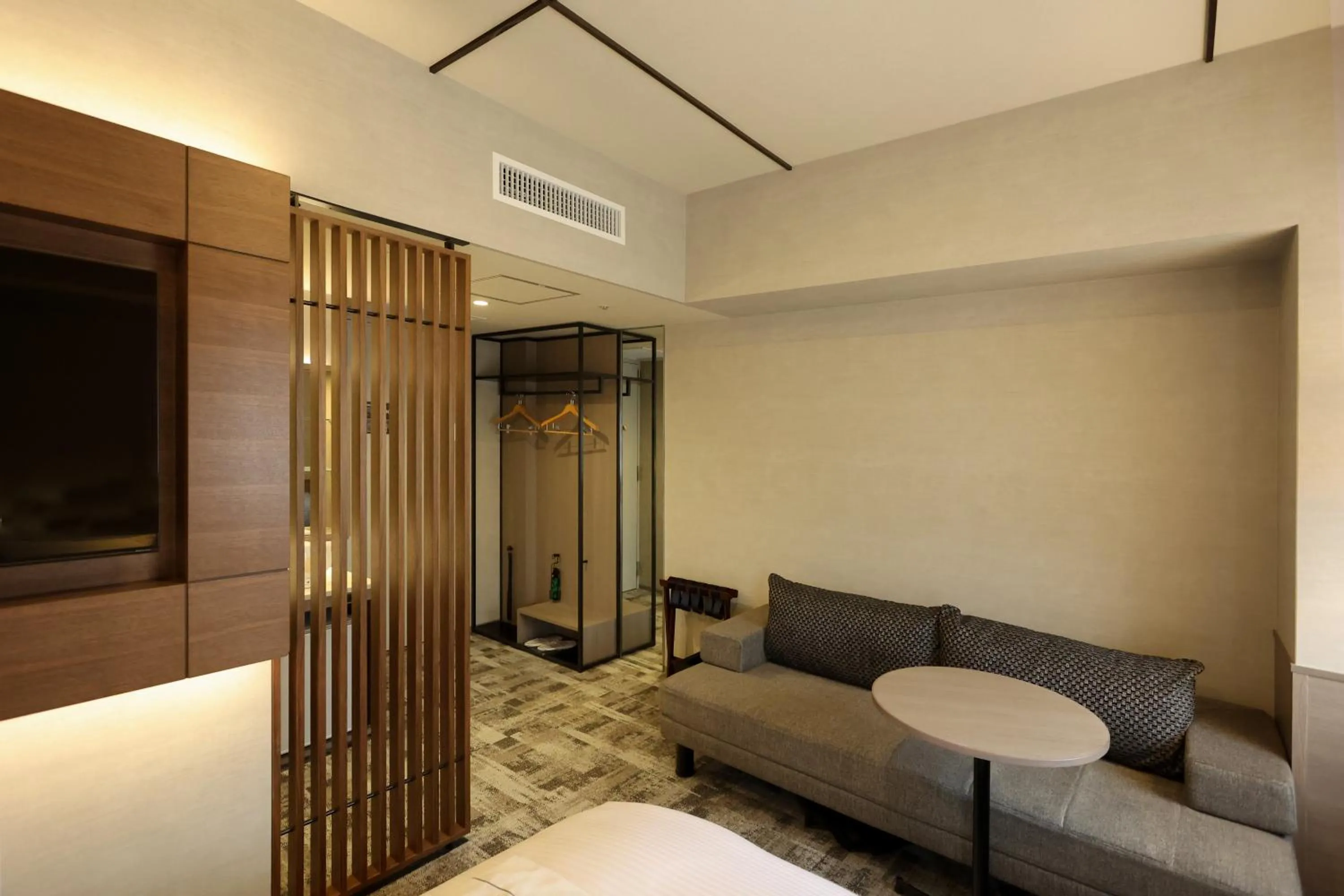 Seating area, Bed in SK HOTEL Kobe Ekimae