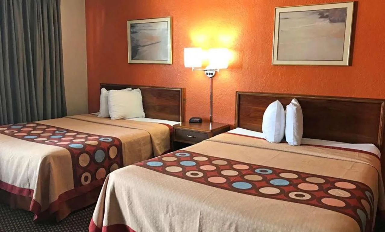 Bed in Happy Stay Inn