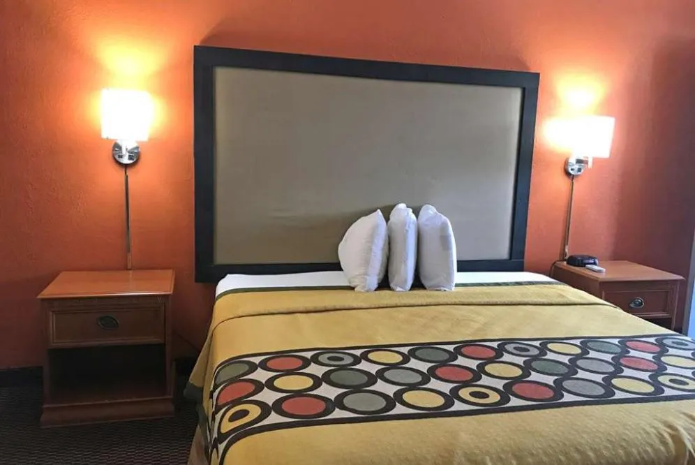 Bed in Happy Stay Inn