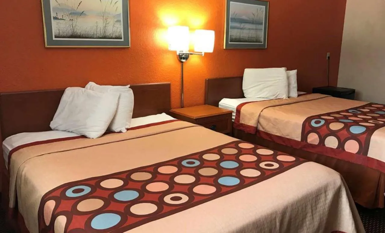 Bed in Happy Stay Inn