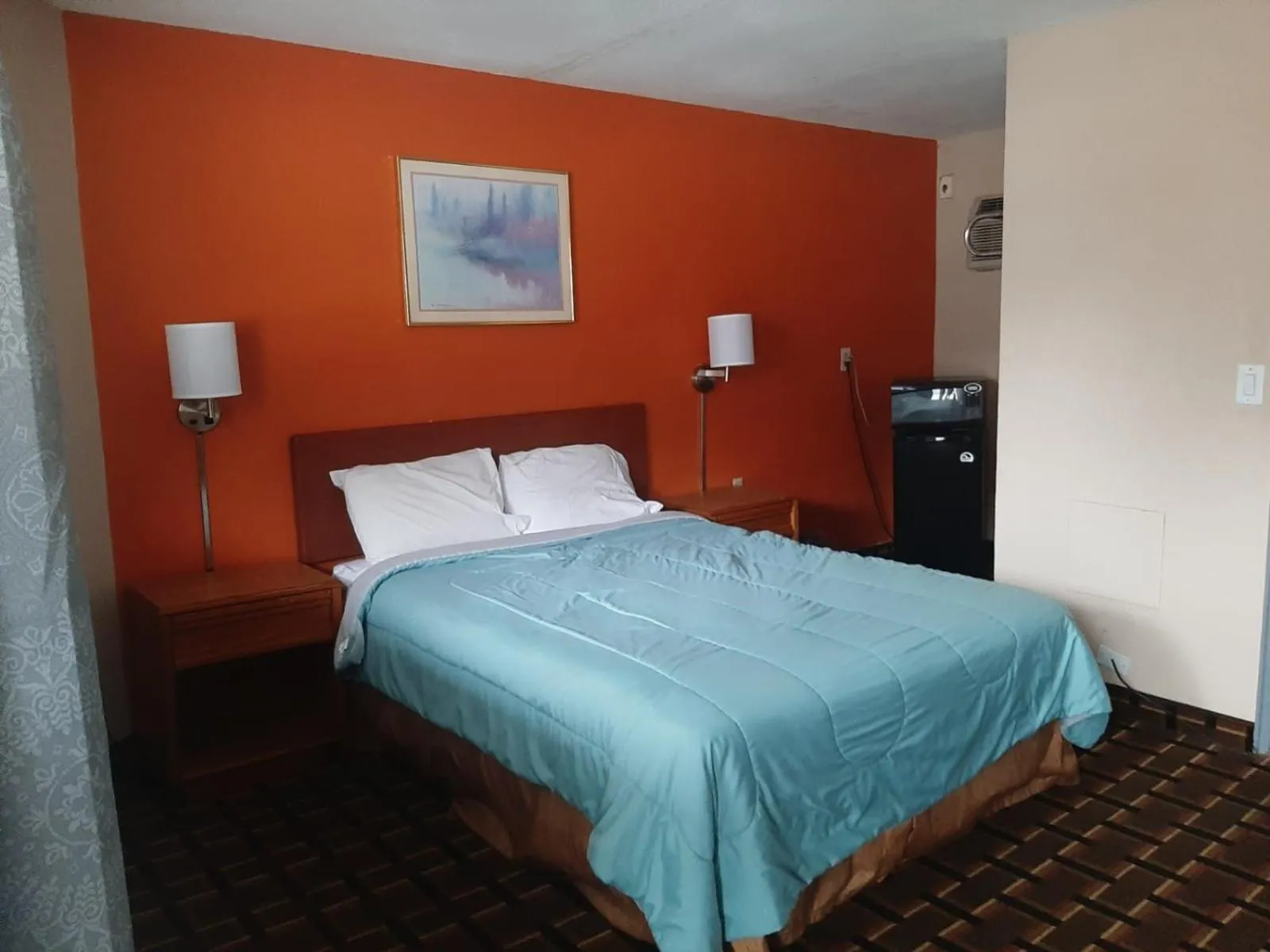 Bed in Happy Stay Inn