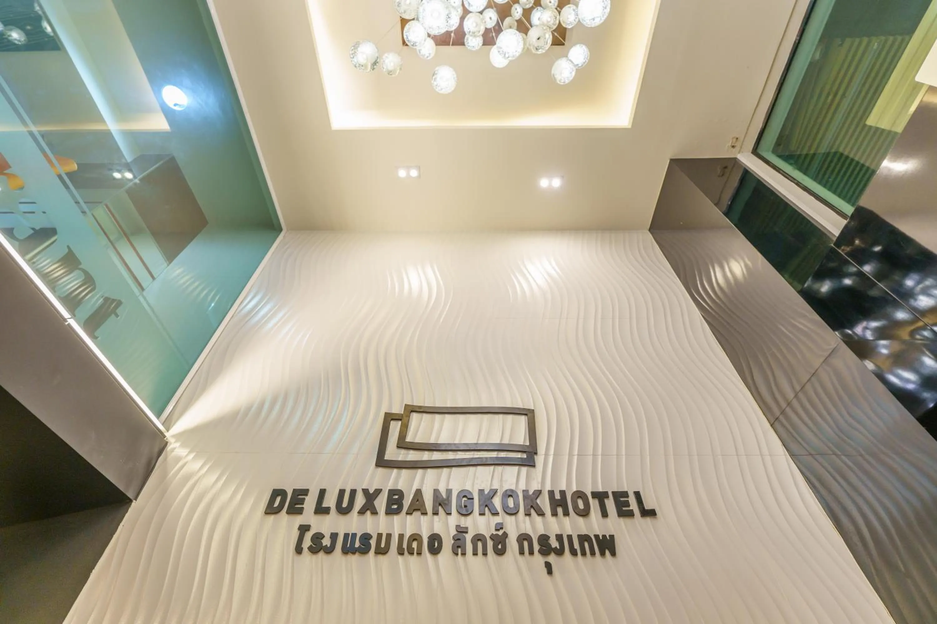 Property logo or sign, Bed in De Lux Bangkok Hotel
