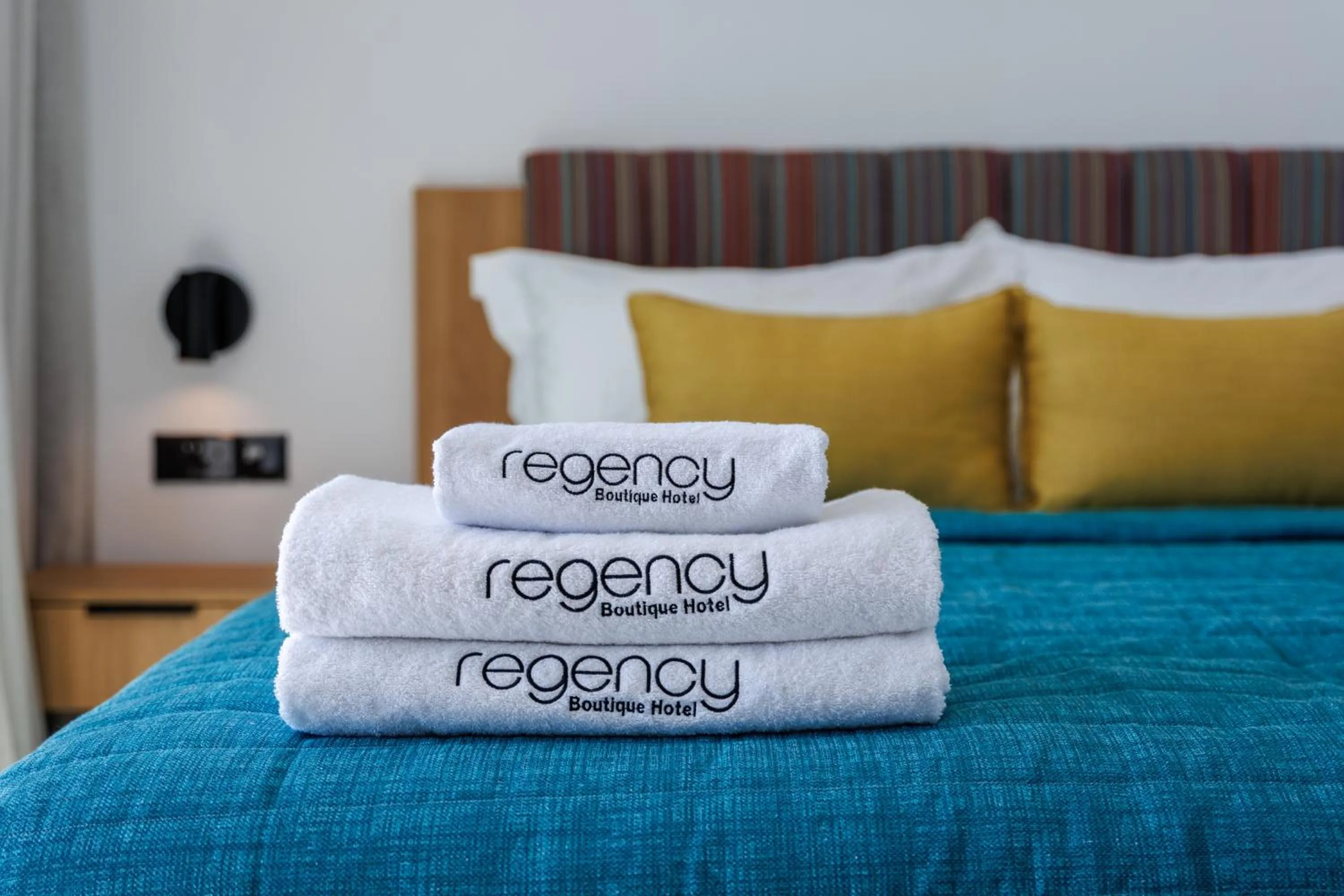 Bed in Regency Boutique Hotel Holiday Suites