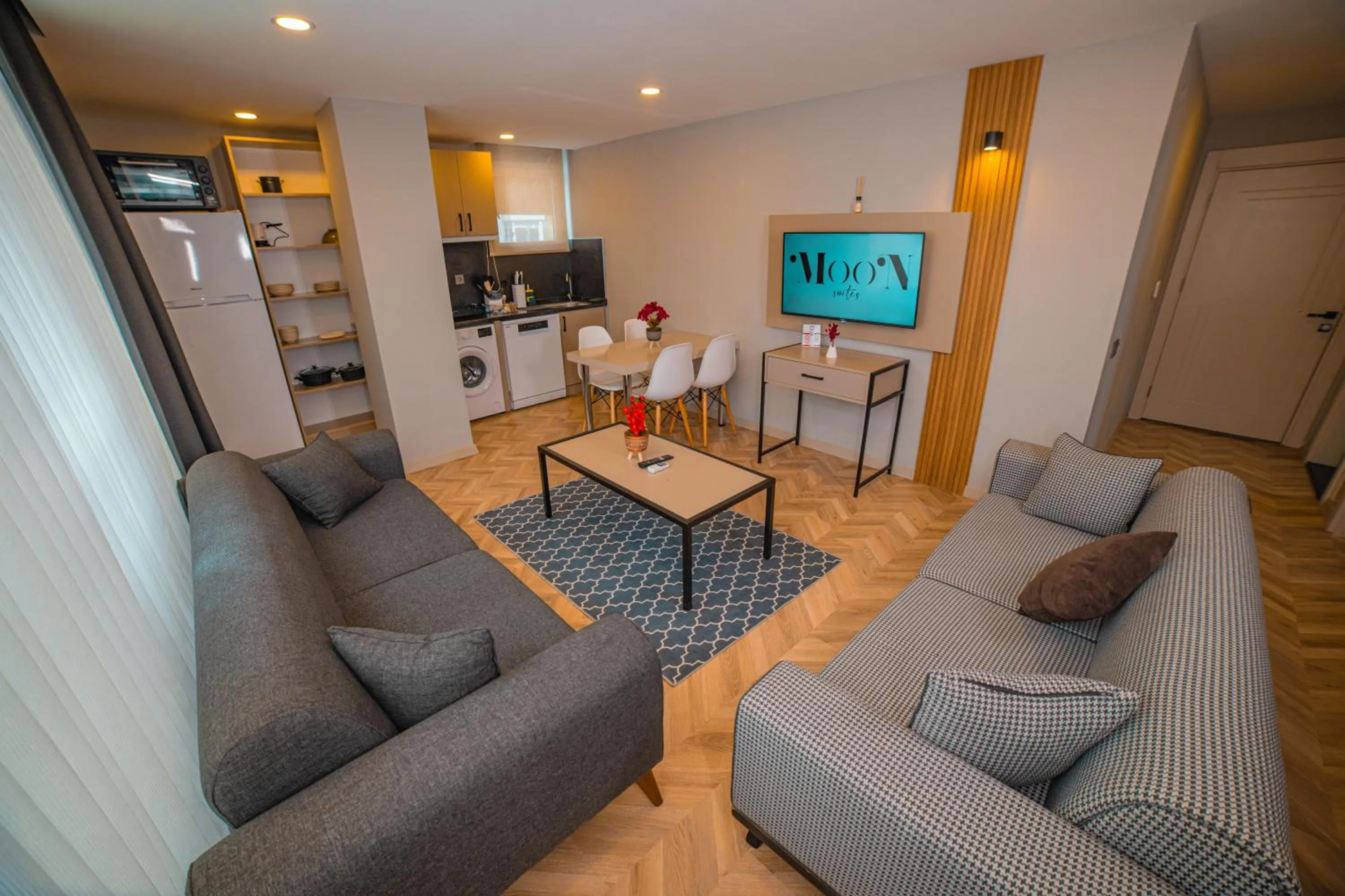 Communal lounge/ TV room in Moon Suites