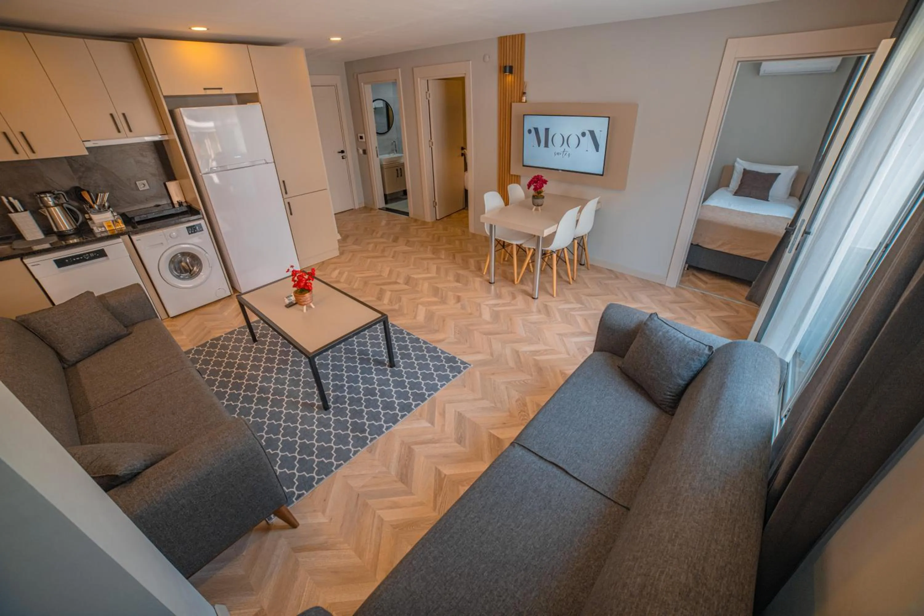 Communal lounge/ TV room in Moon Suites