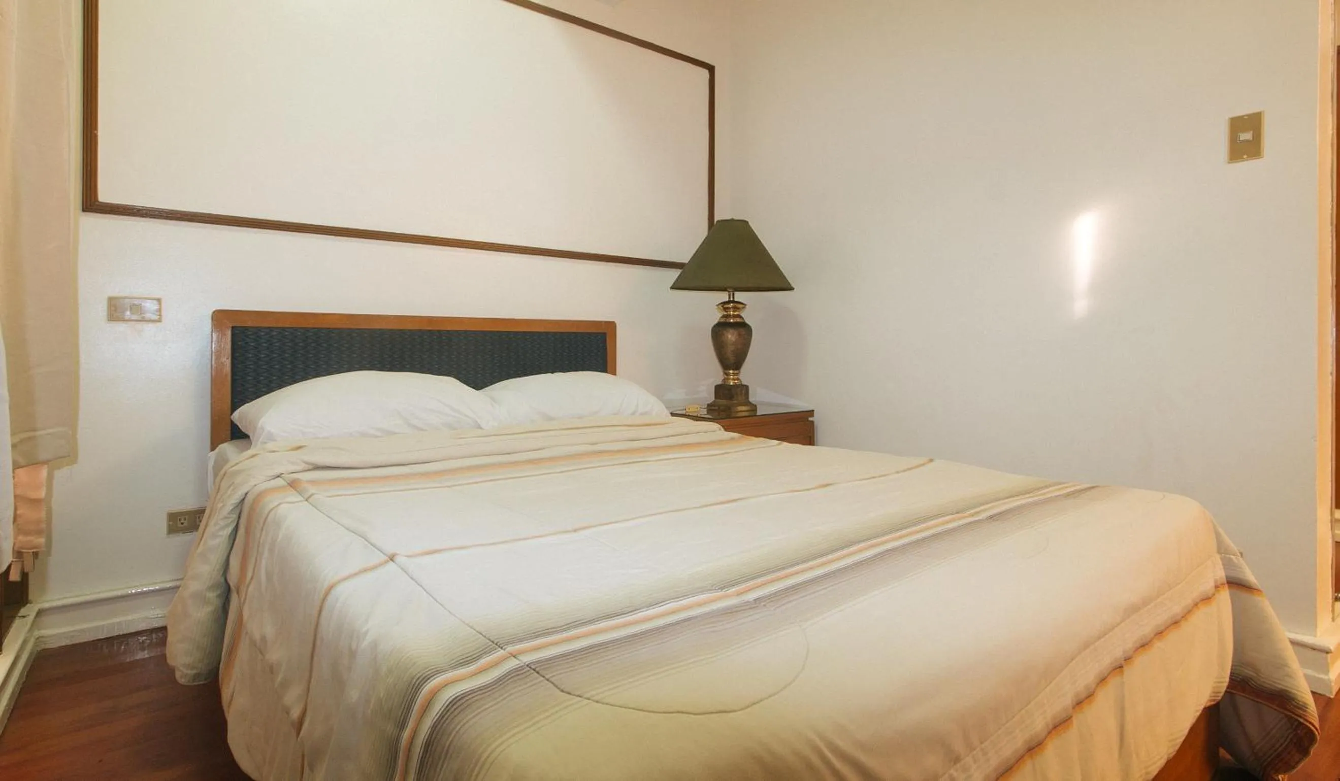 Bed in Sunette Tower Makati