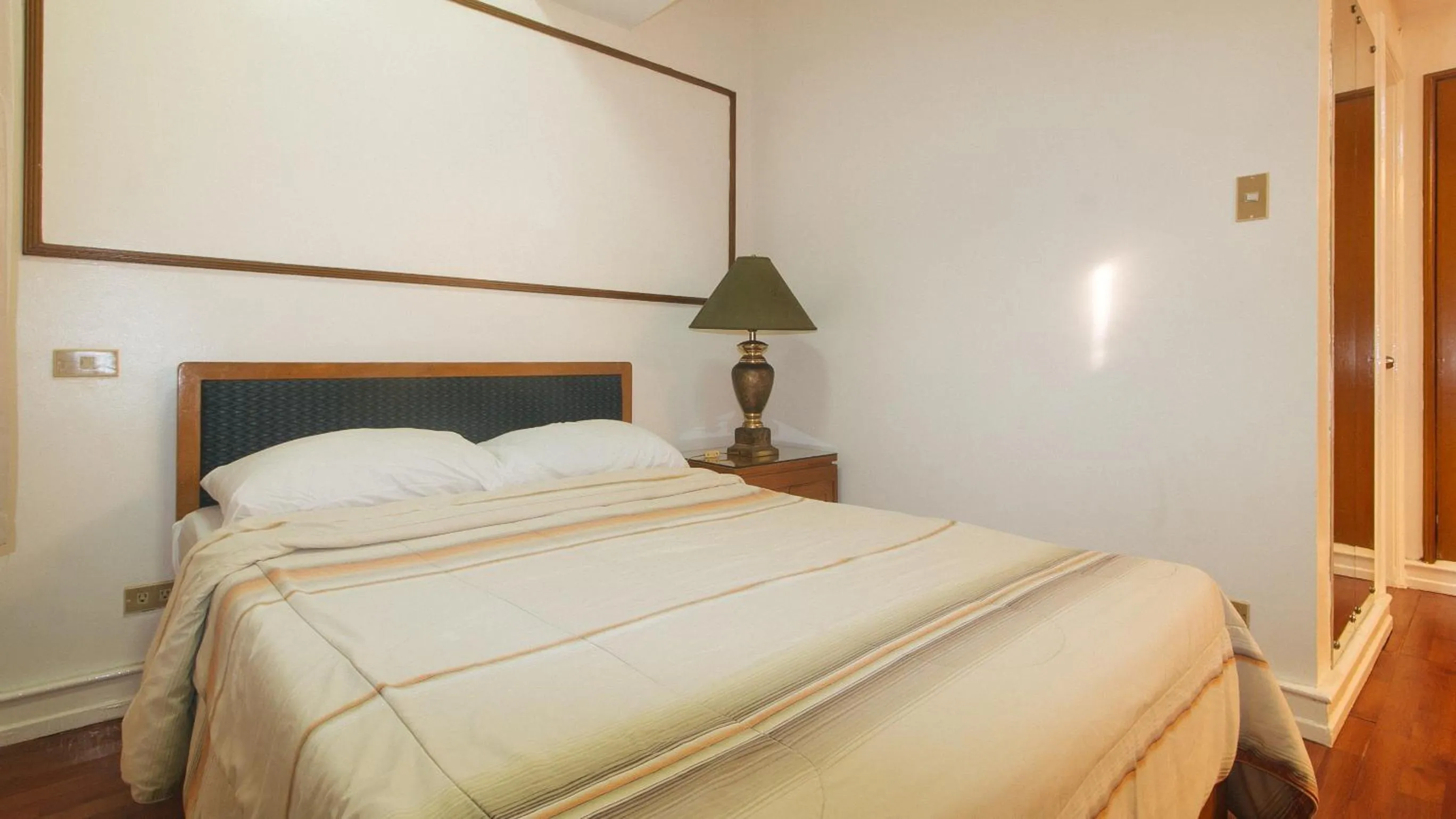 Bed in Sunette Tower Makati