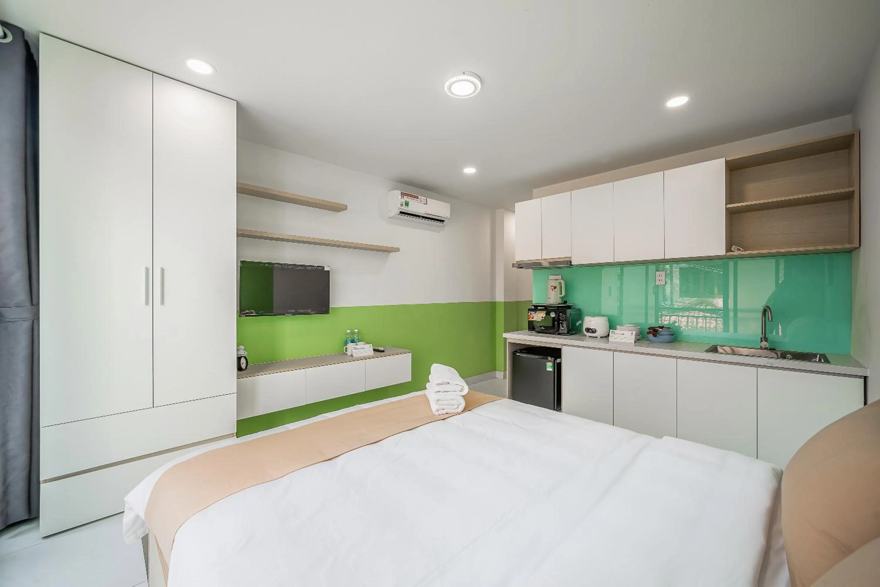 Bed in Cozrum Homes - Coraline House