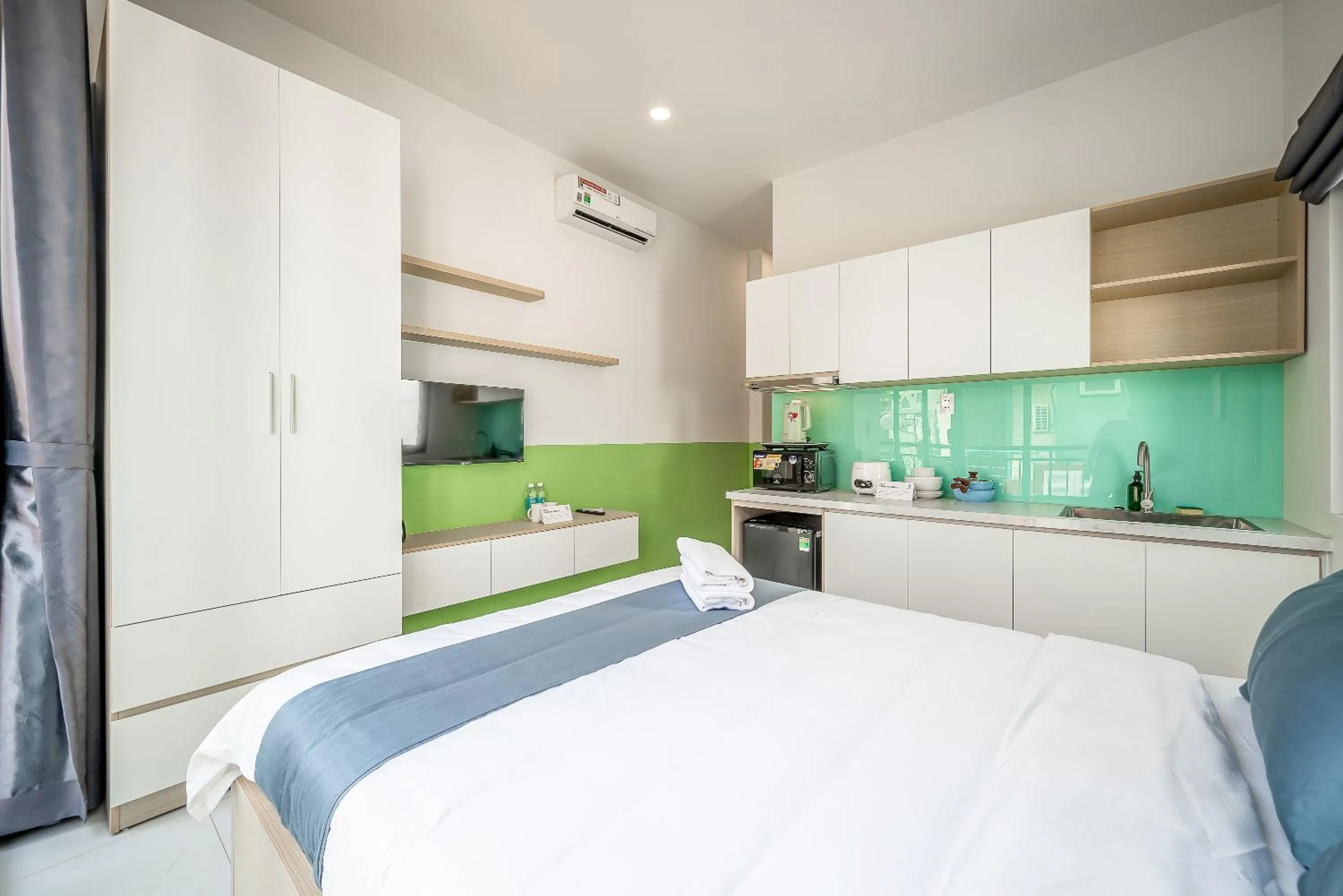 Bed in Cozrum Homes - Coraline House