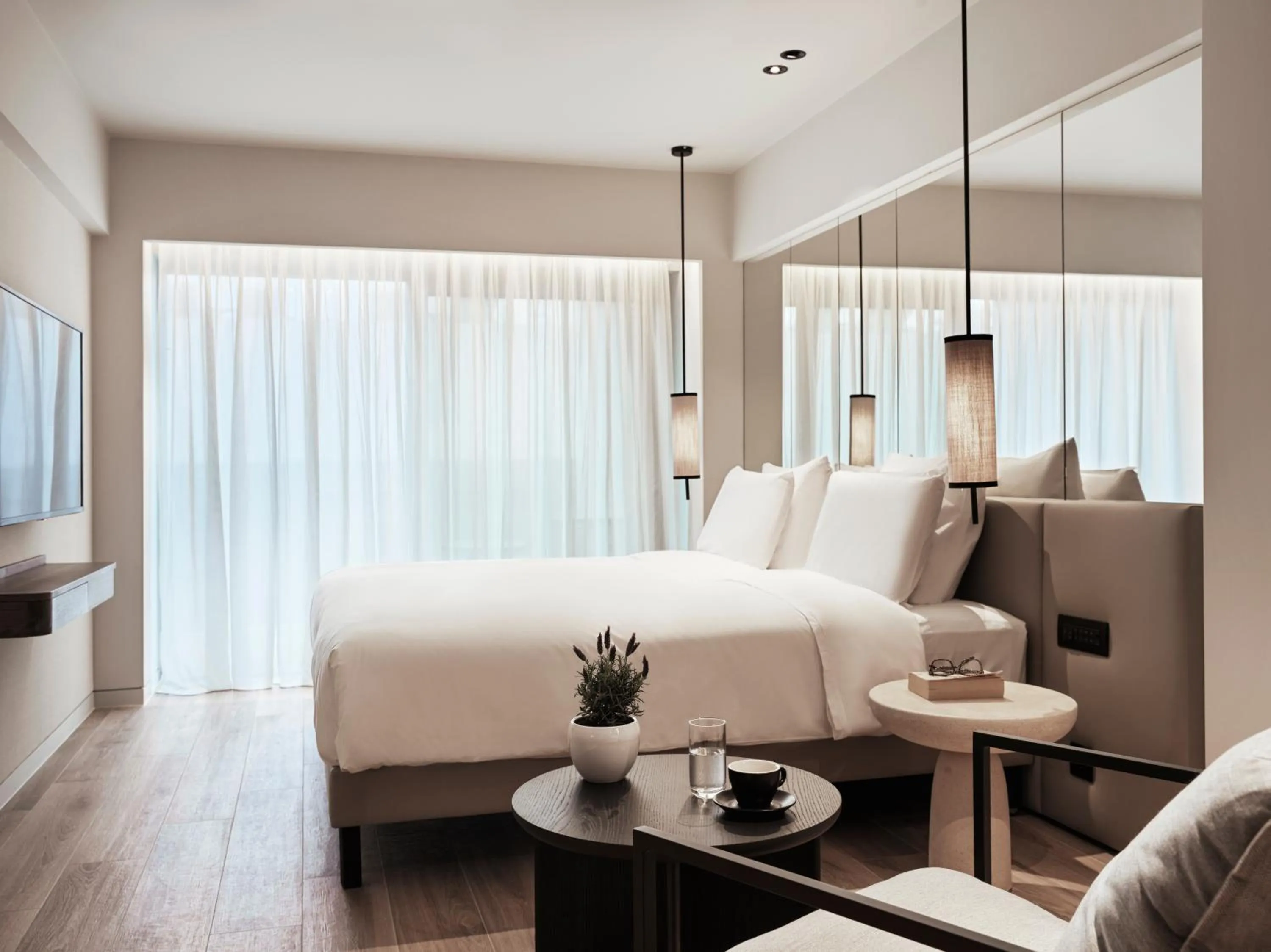 Photo of the whole room, Bed in NIKO Seaside Resort MGallery