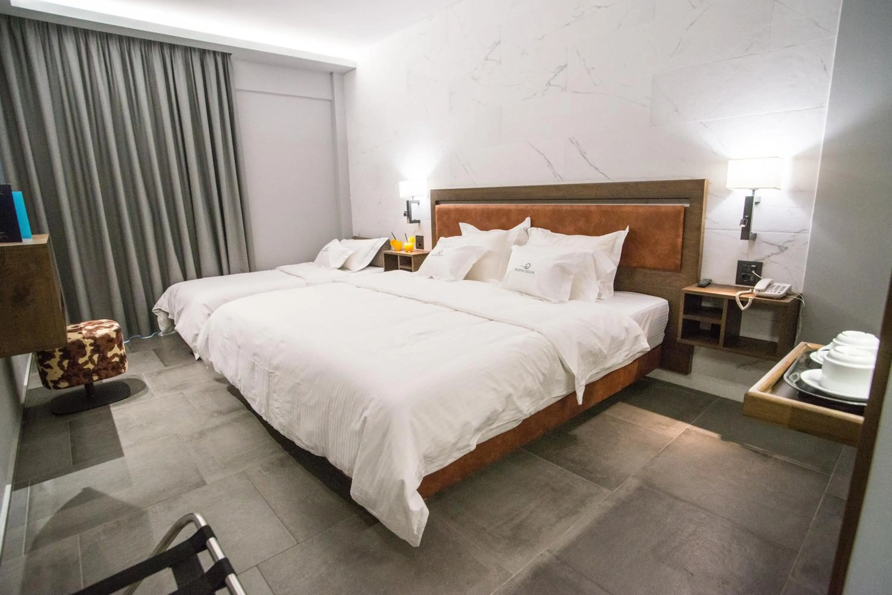 Bed in Palmyra Beach Hotel