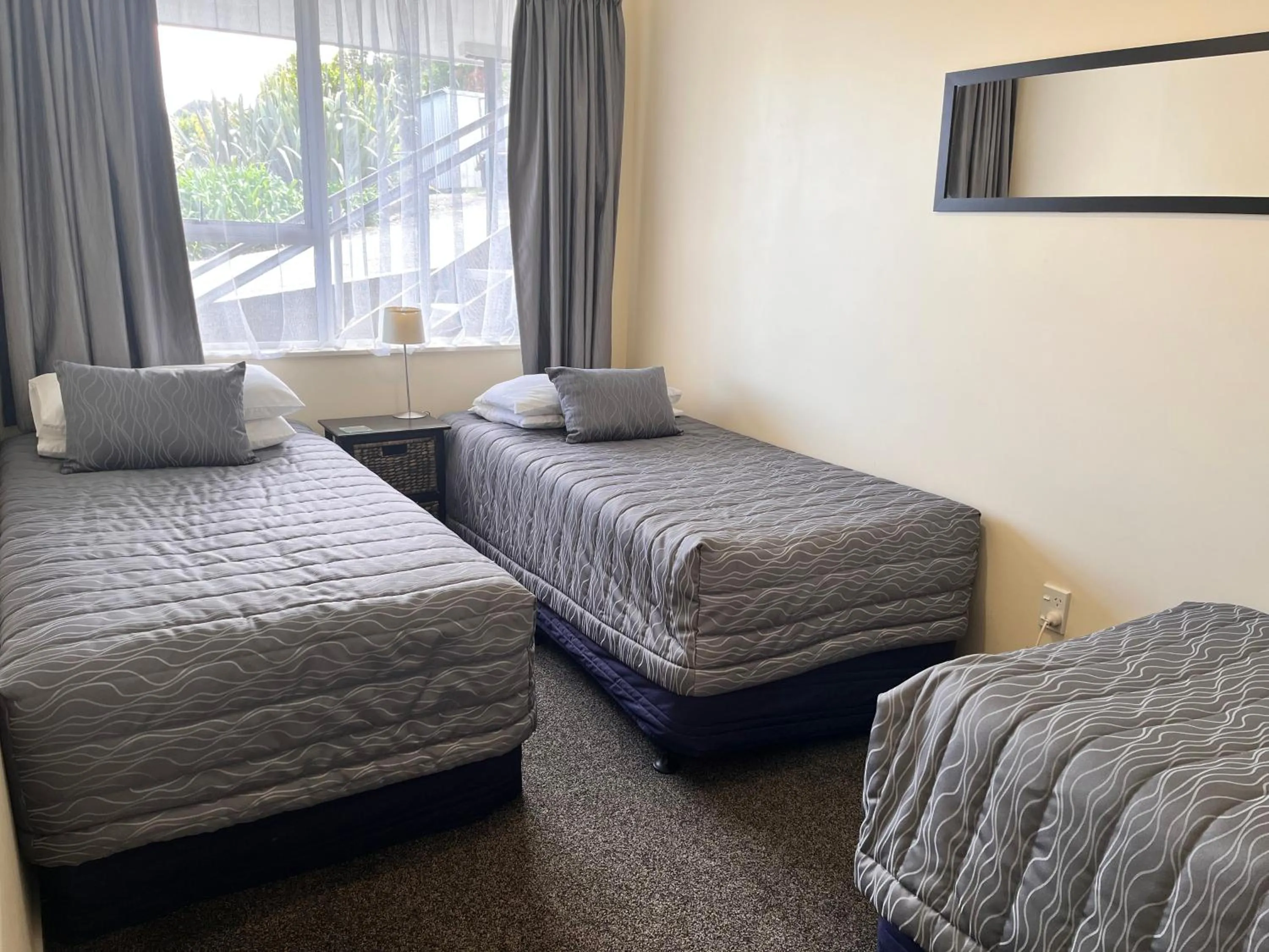 Bed in Sundowner Motel