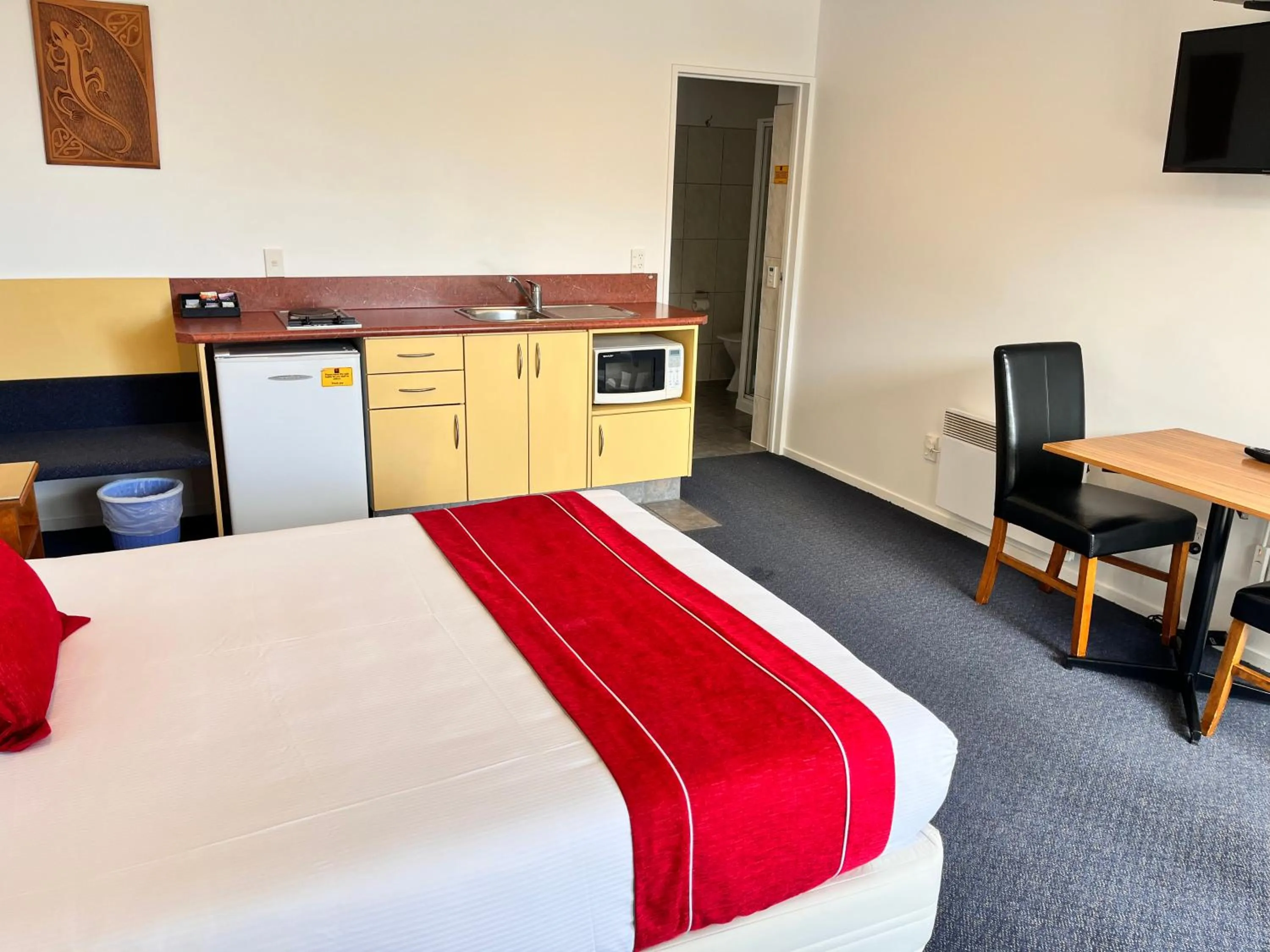 Bed in Sundowner Motel