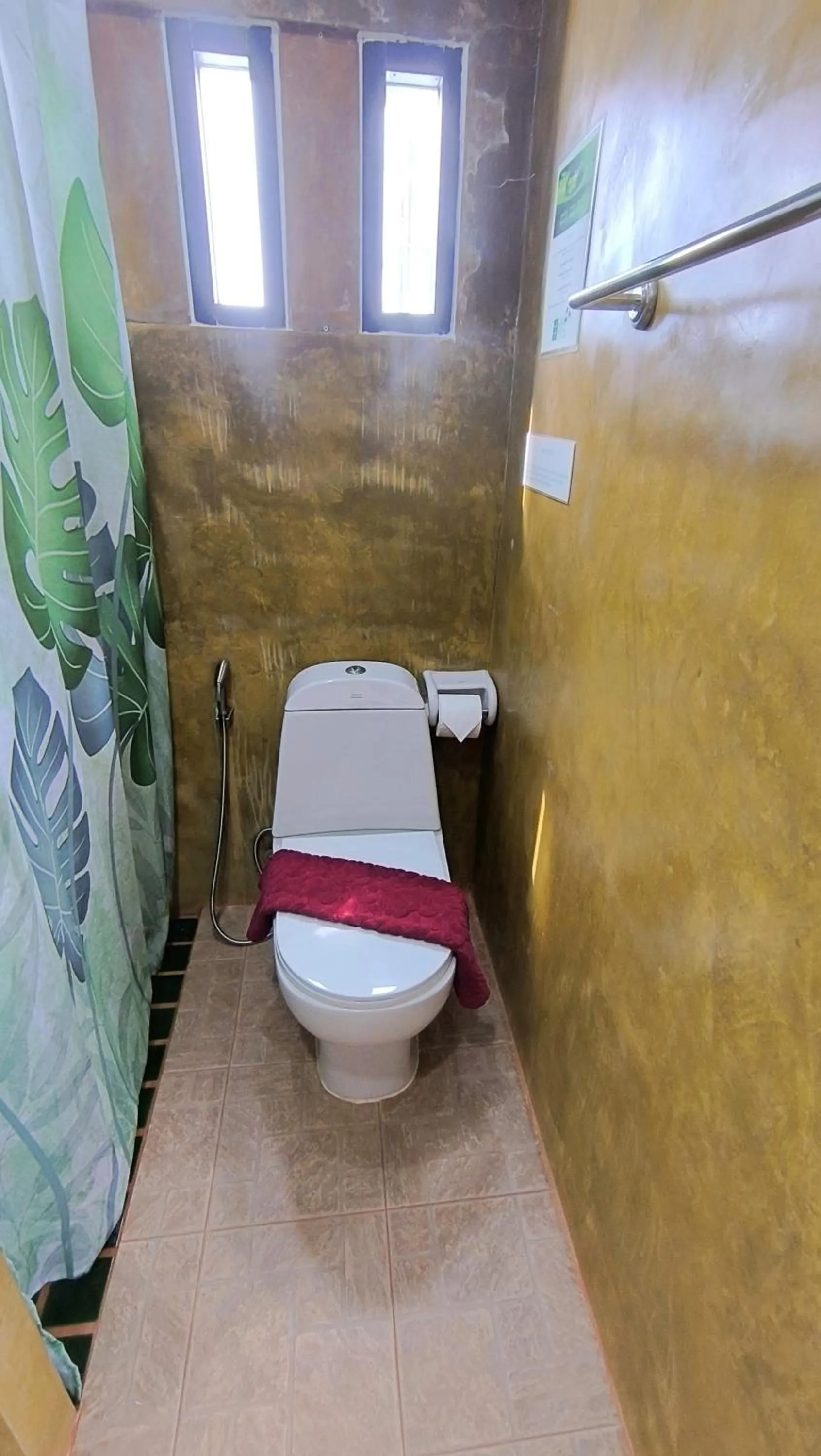 Toilet in Southern Comfort Patong