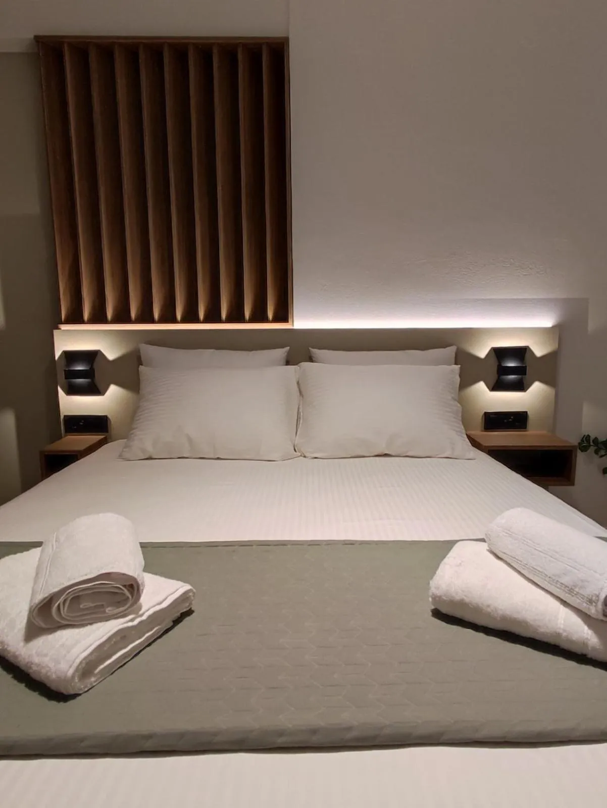 Bed in Ruby Luxury Suites