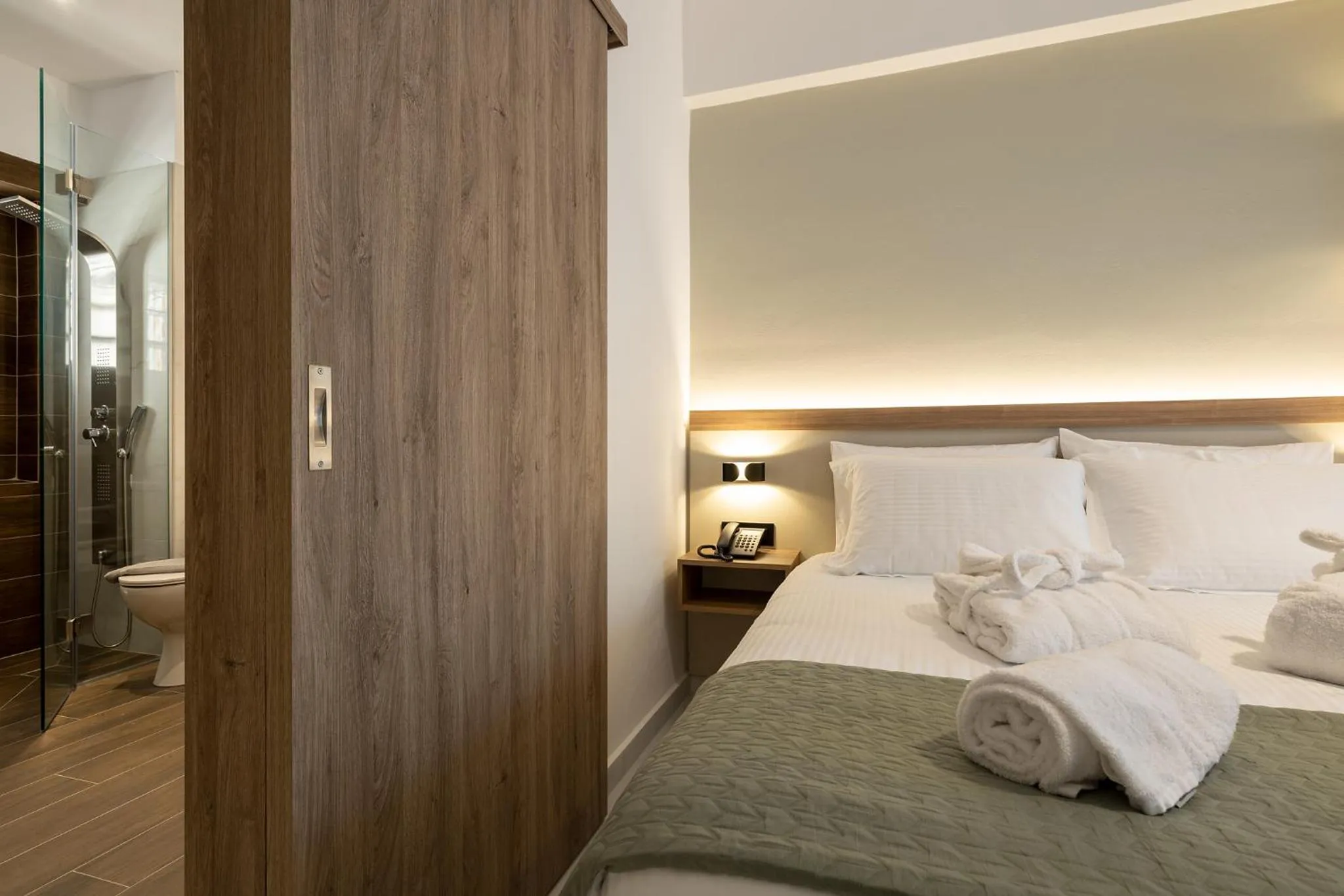 Bed in Ruby Luxury Suites