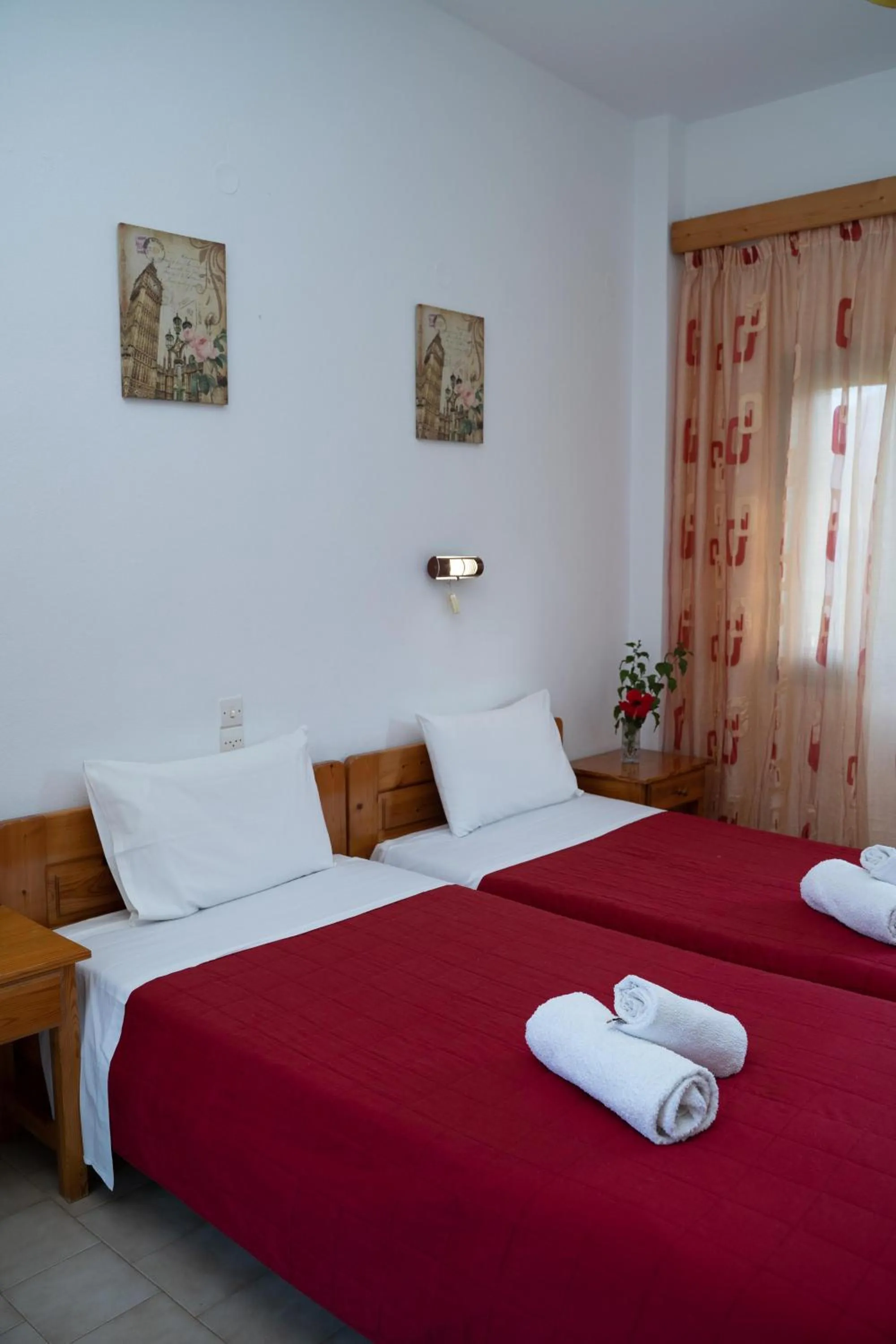 Bed in Dimitris Villa Hotel