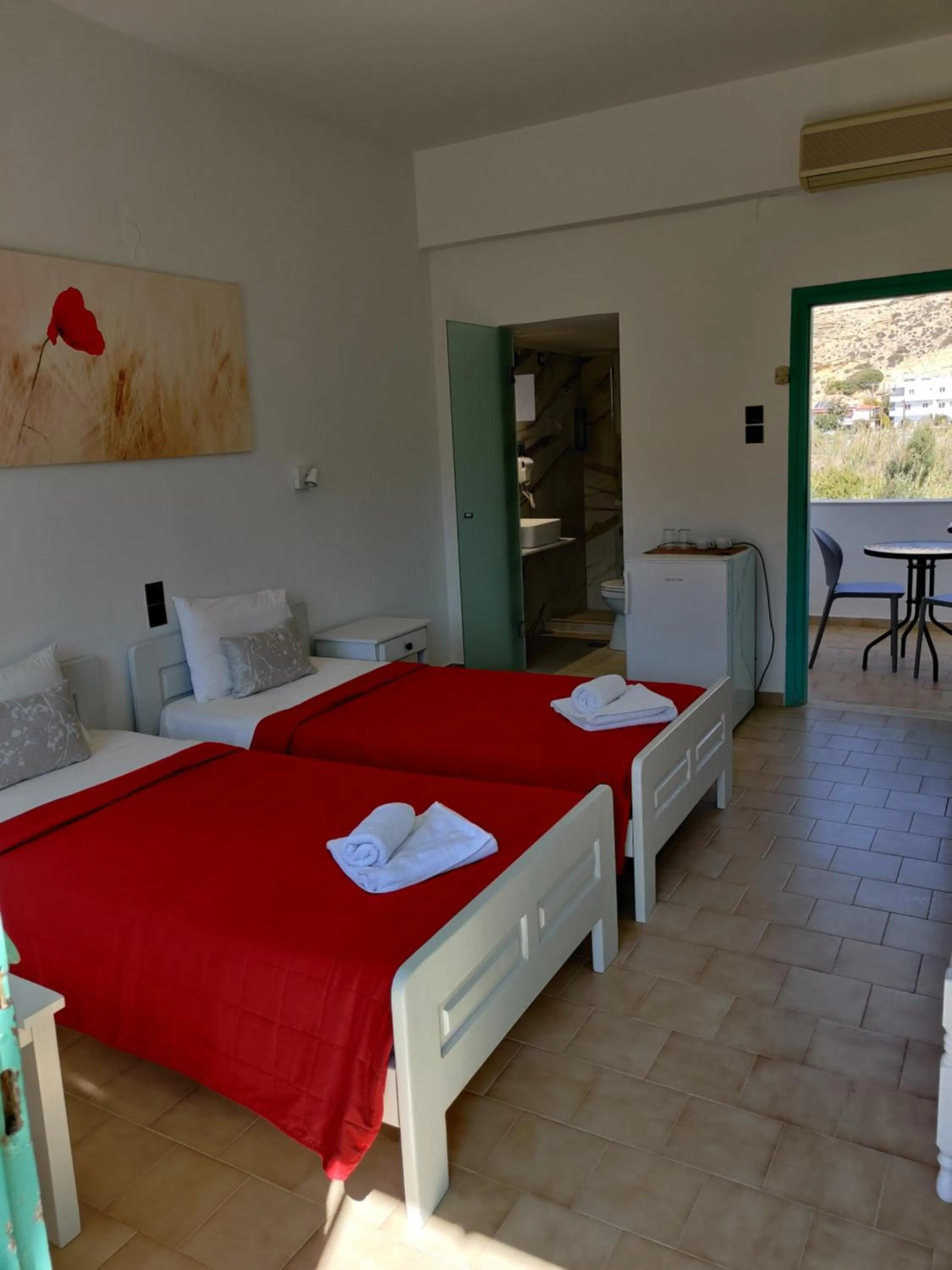 Bed in Dimitris Villa Hotel