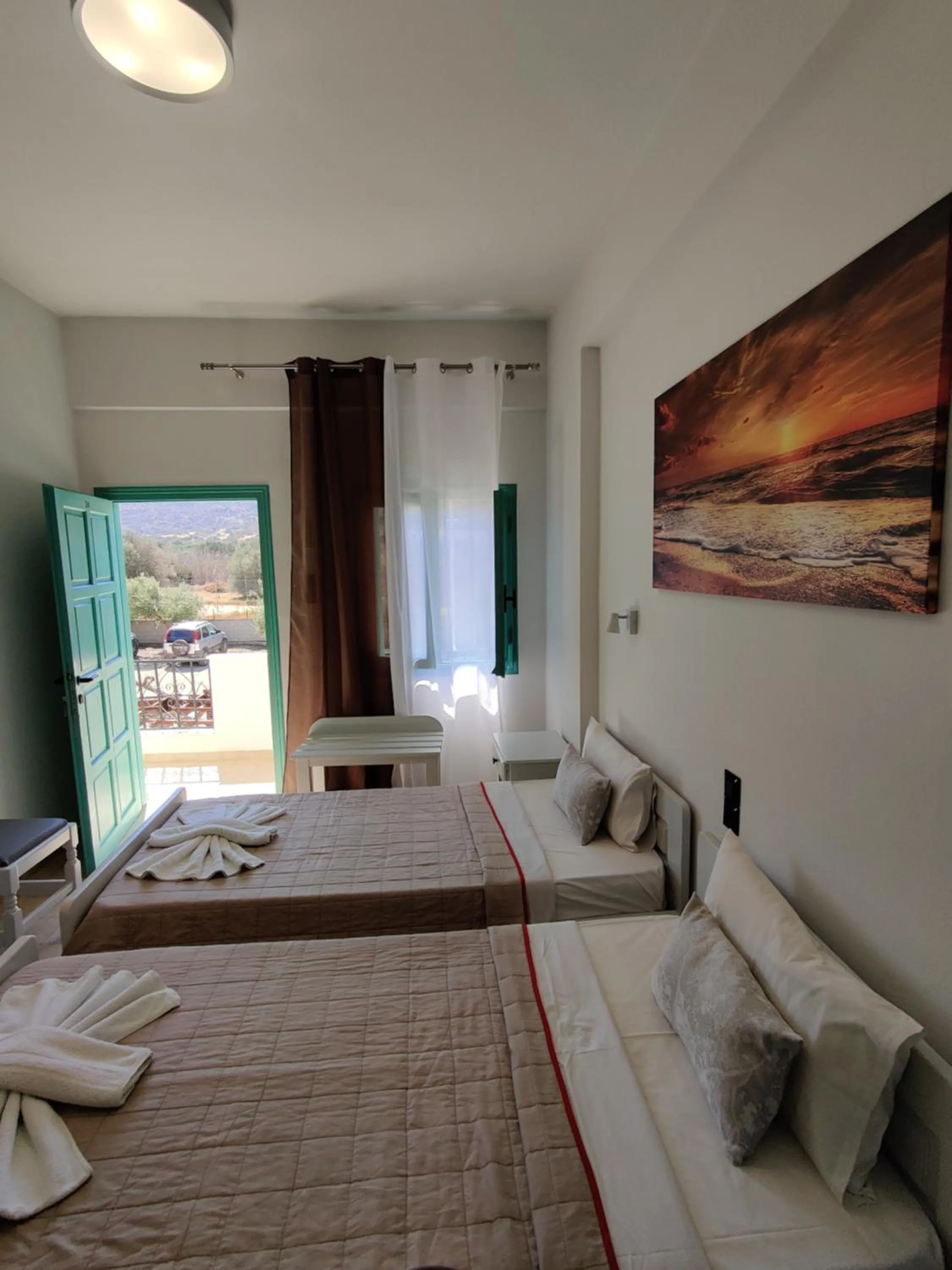 Bed in Dimitris Villa Hotel