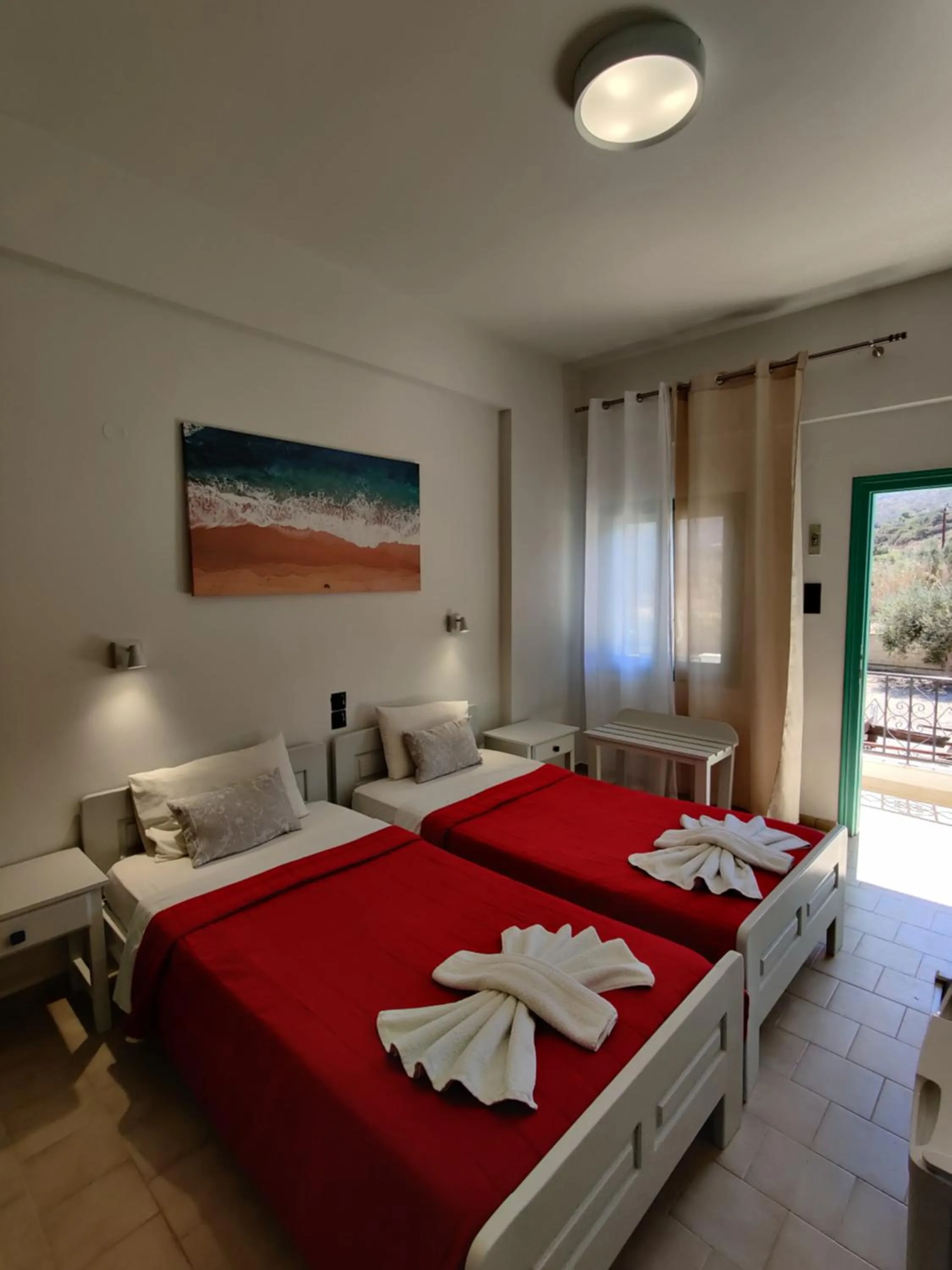Bed in Dimitris Villa Hotel
