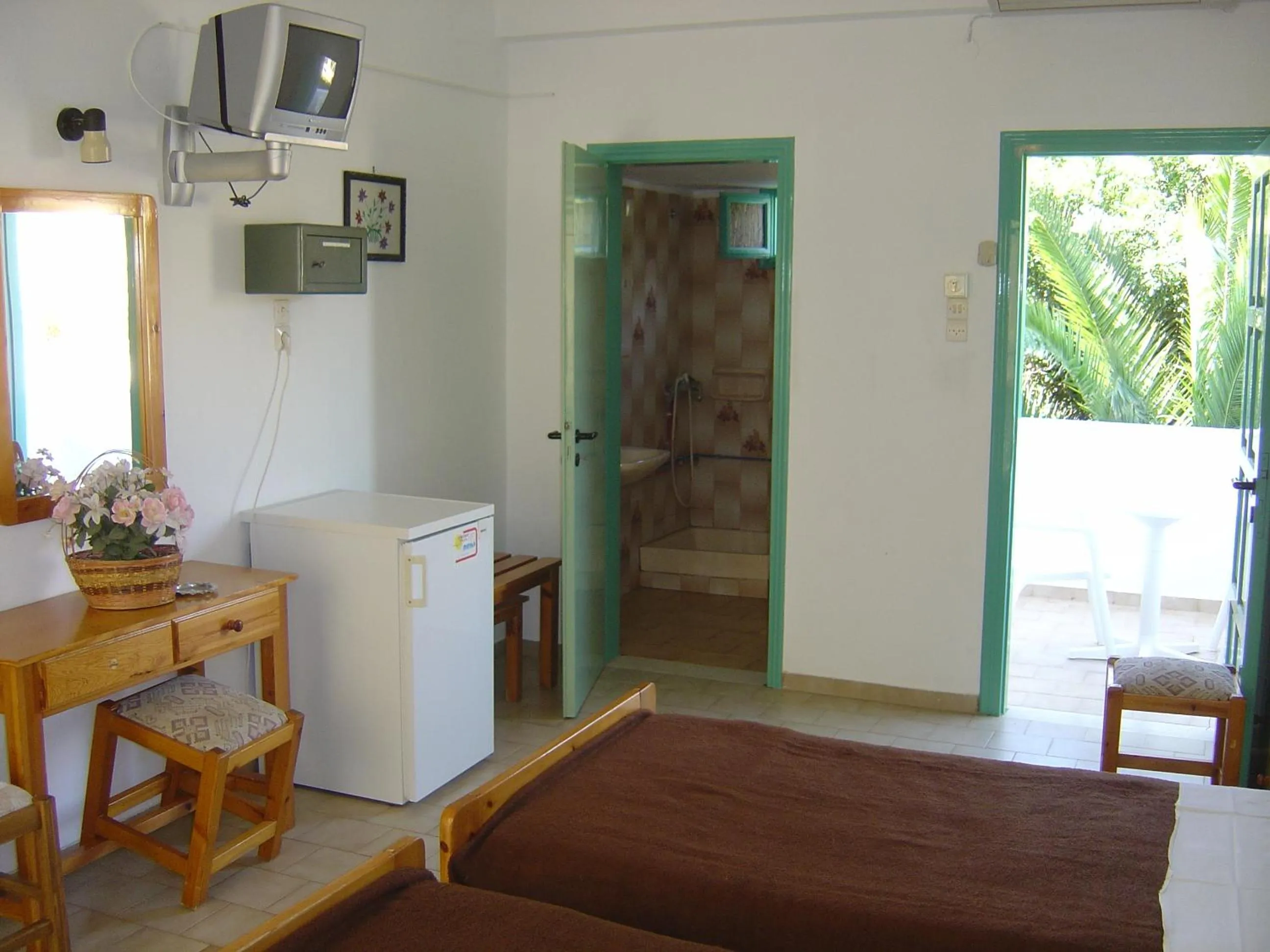 Bed in Dimitris Villa Hotel