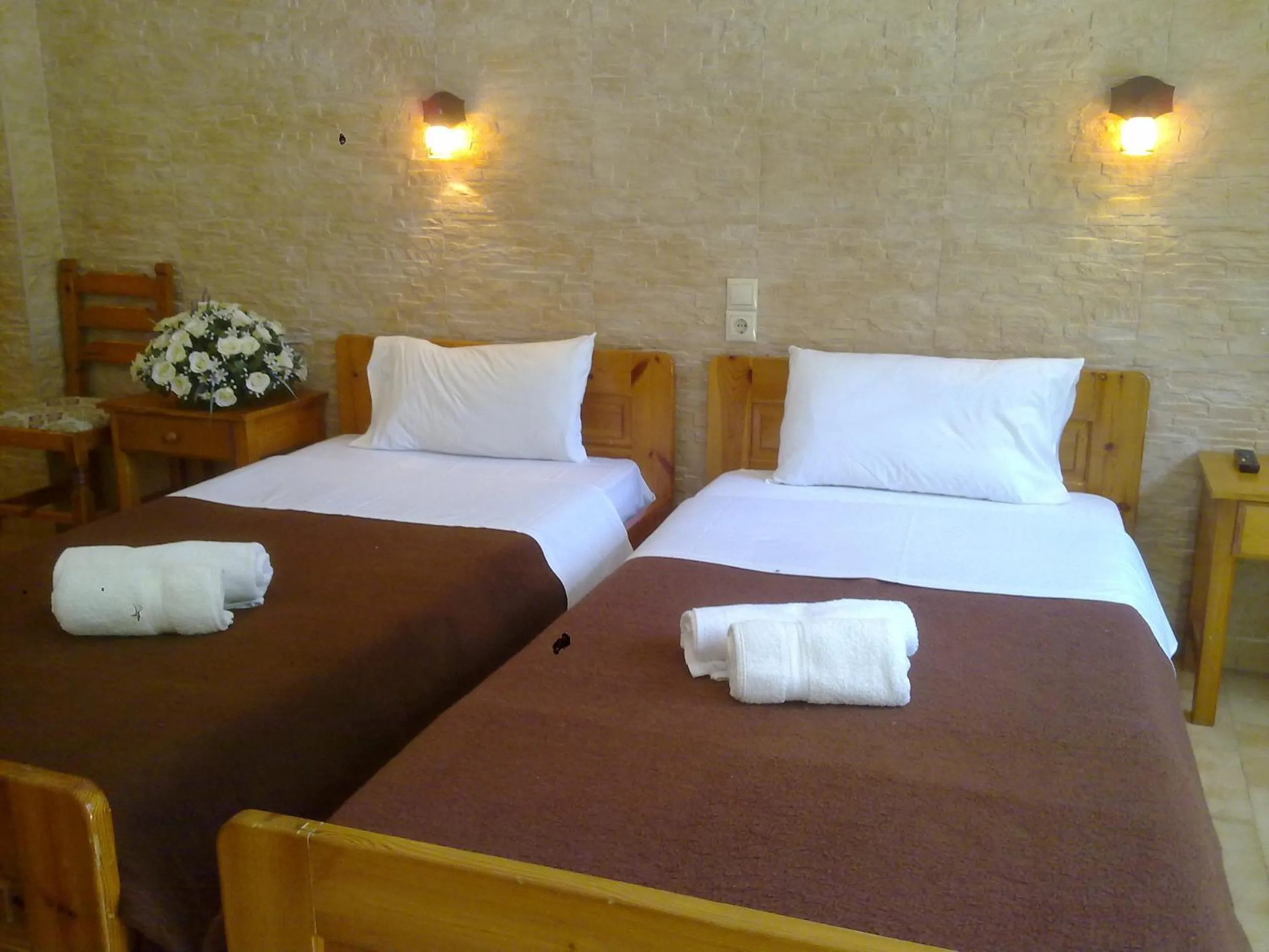Bed in Dimitris Villa Hotel