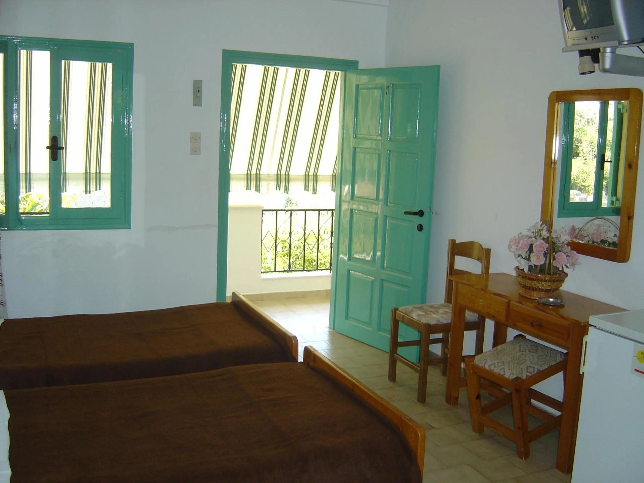 Bed in Dimitris Villa Hotel