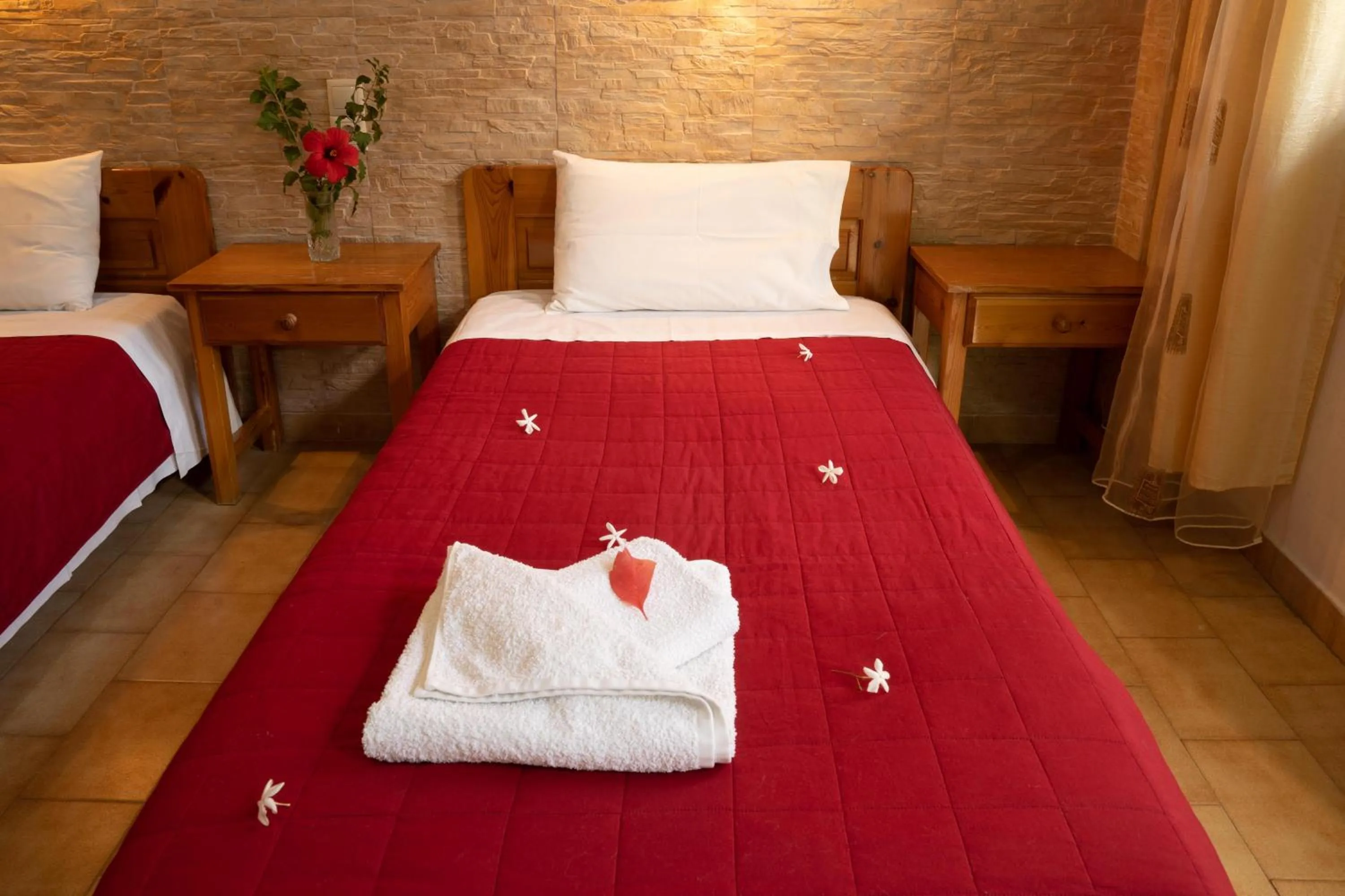 Bed in Dimitris Villa Hotel