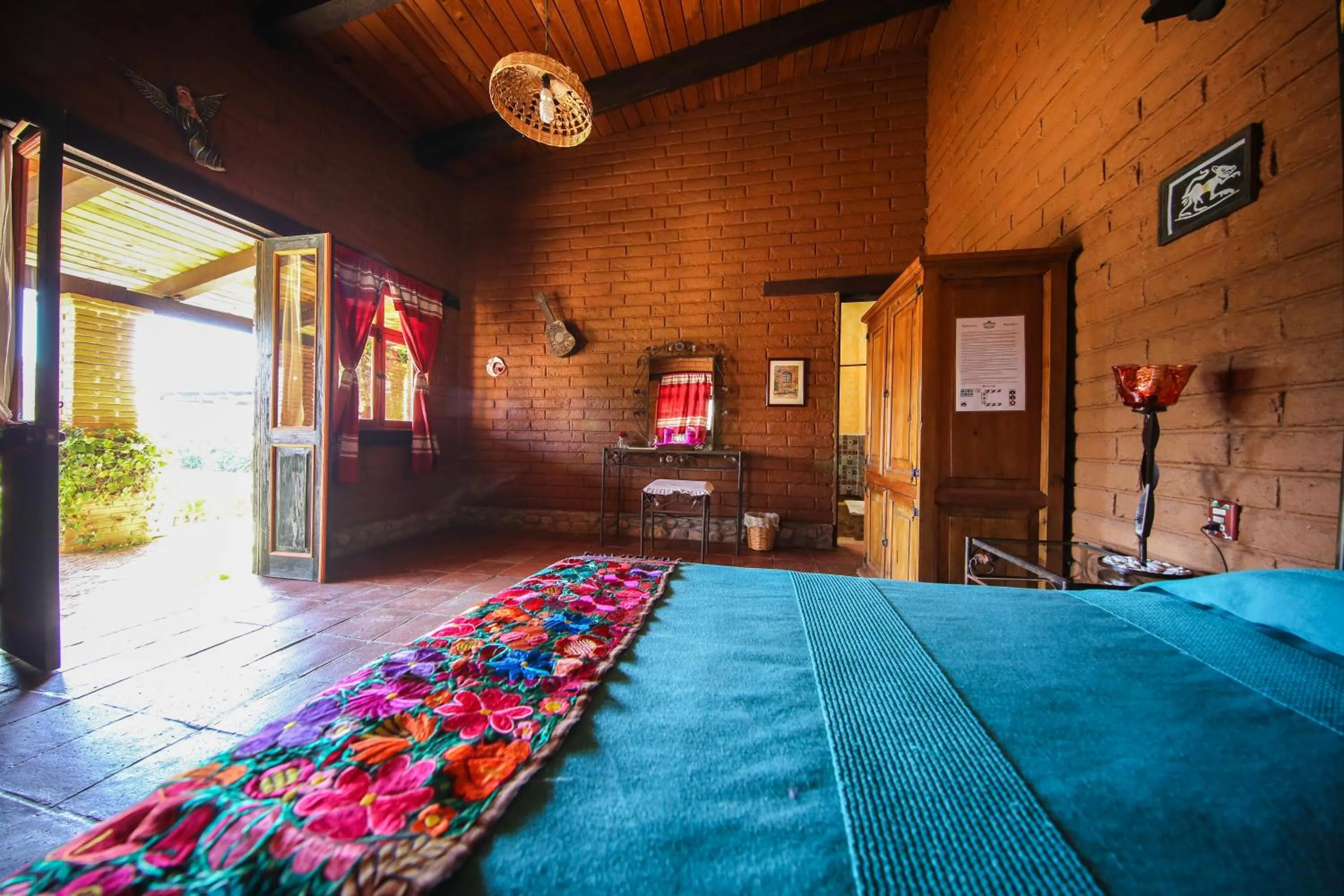 Bed in Huayápam Yù'ú Lodge