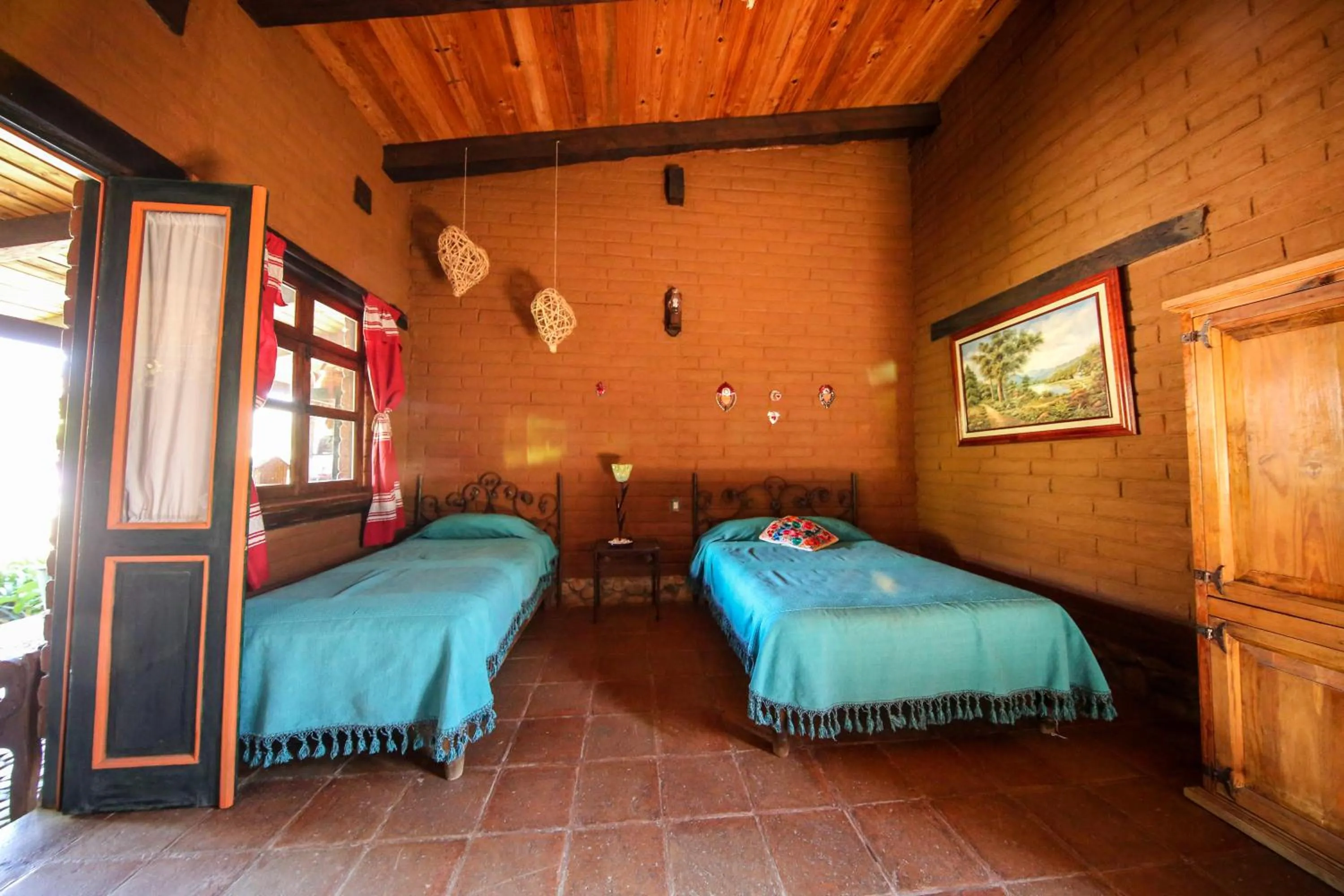 Bed in Huayápam Yù'ú Lodge