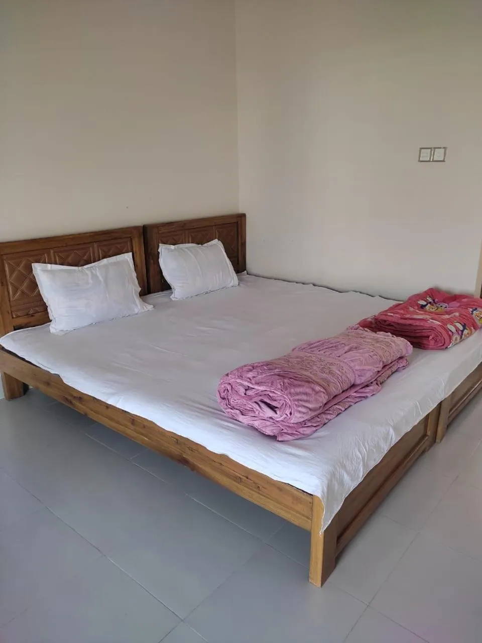 Bed in Hotel Grand Brothers