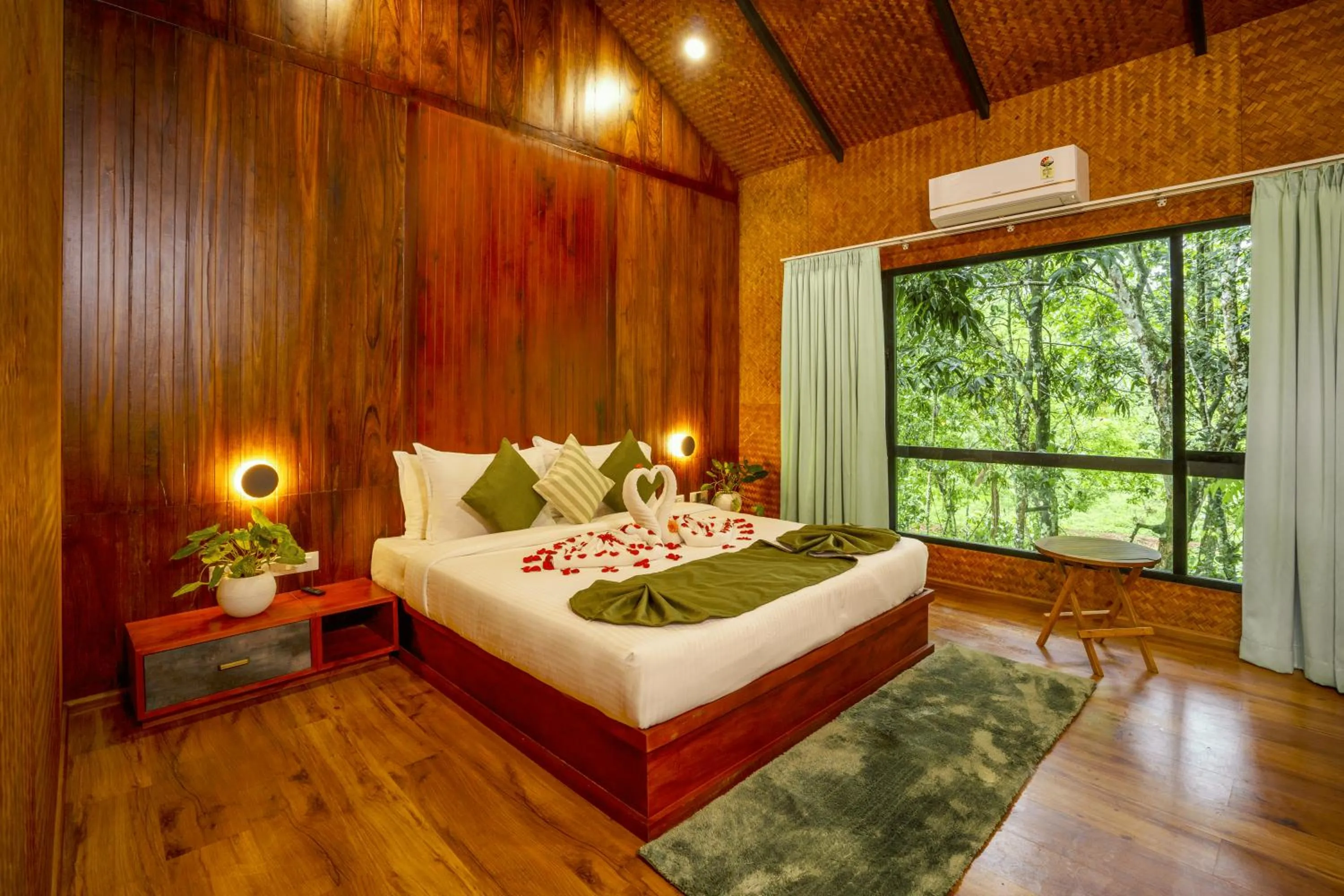 Bed in Crystal Kuruva Nature Resort & Spa