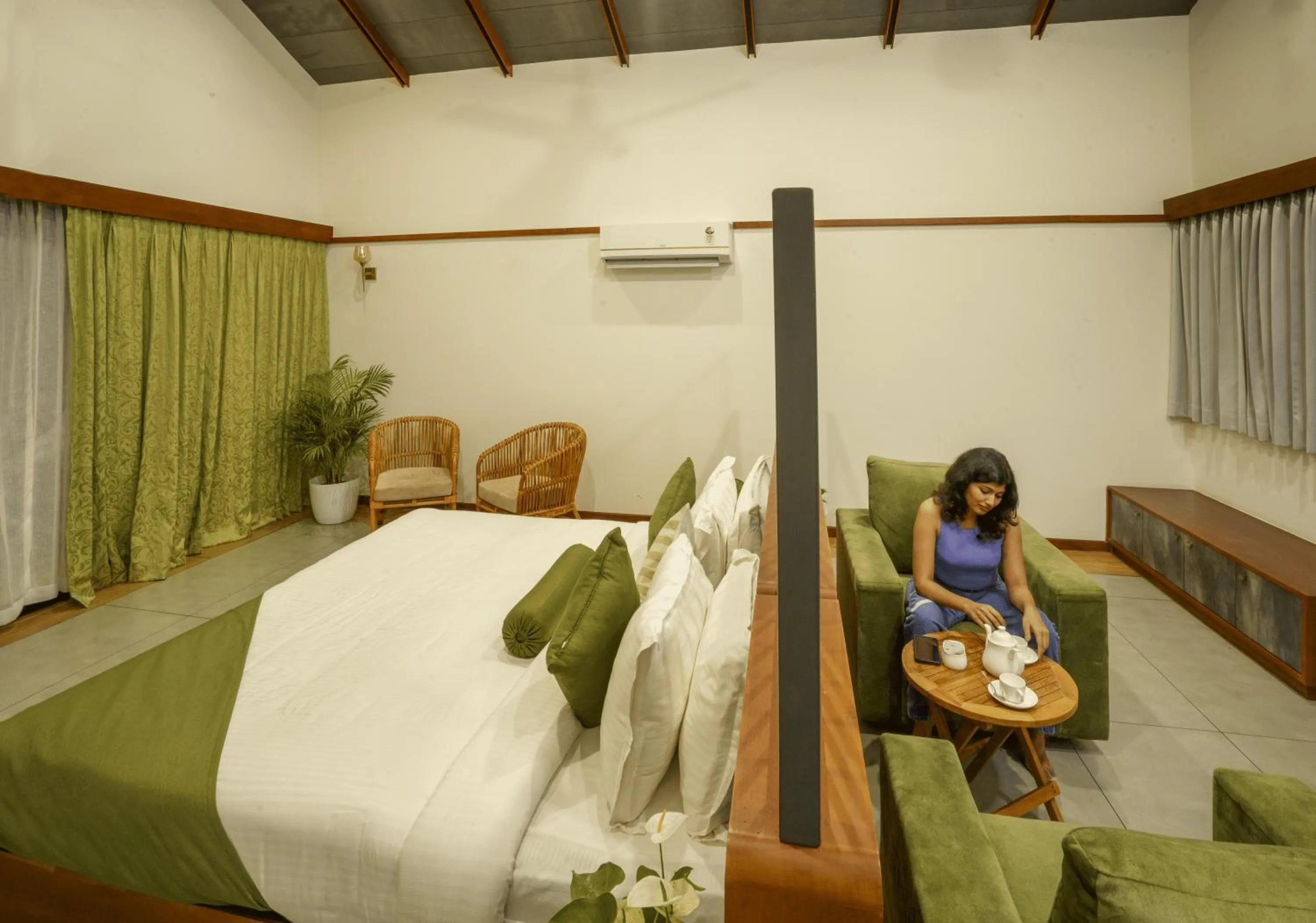 Bed in Crystal Kuruva Nature Resort & Spa
