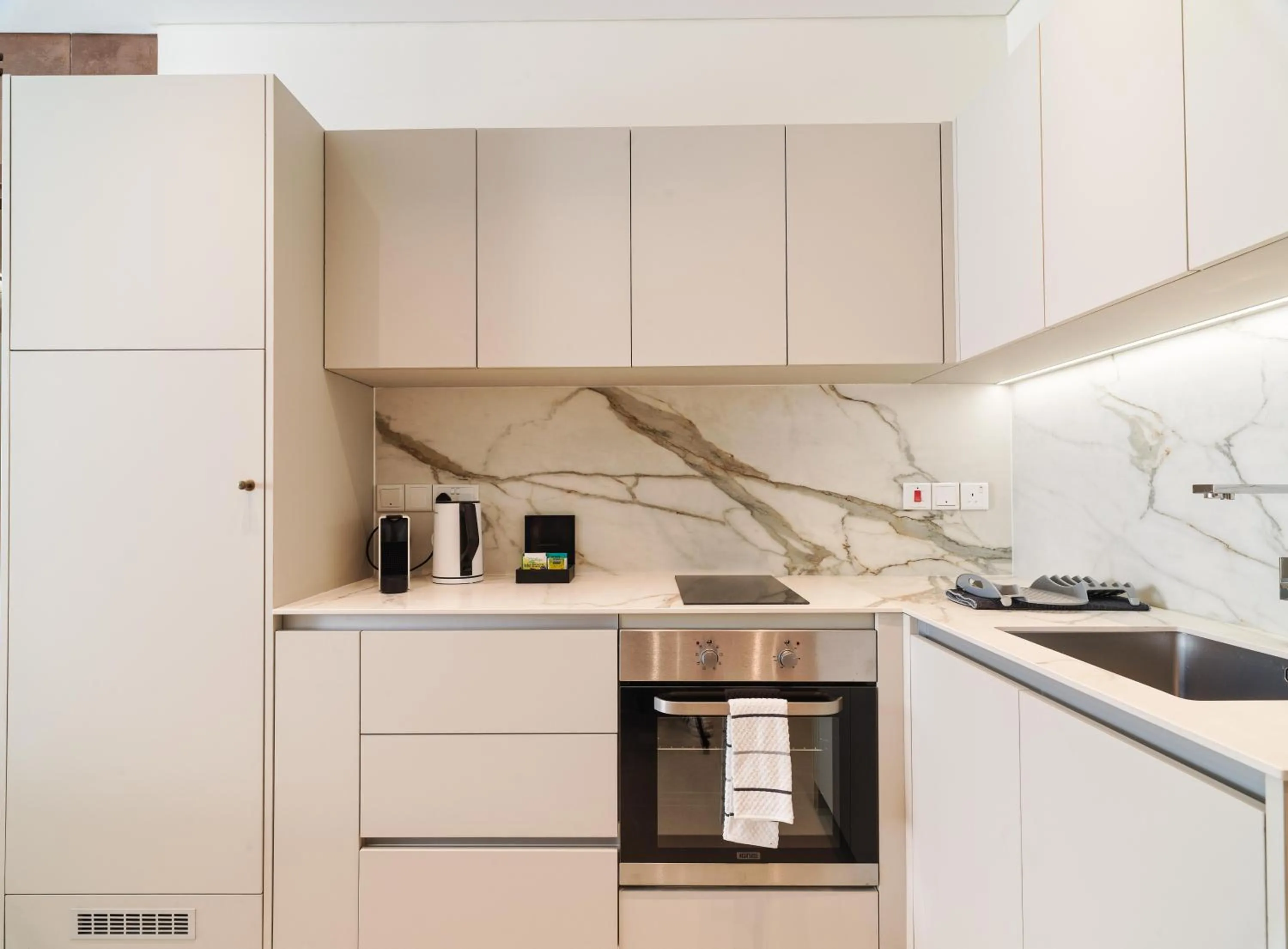 kitchen in LIV Mackenzie Beach Suites Larnaca ADULTS ONLY