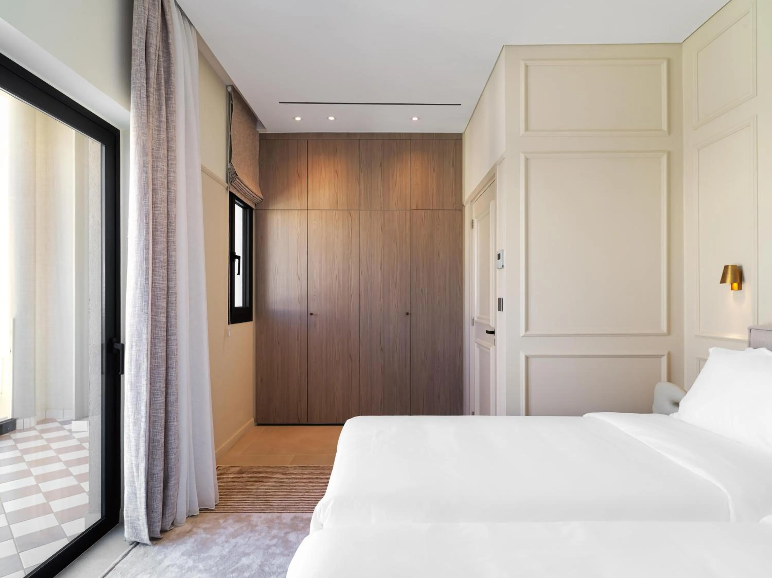 Bedroom, Bed in LIV Mackenzie Beach Suites Larnaca ADULTS ONLY