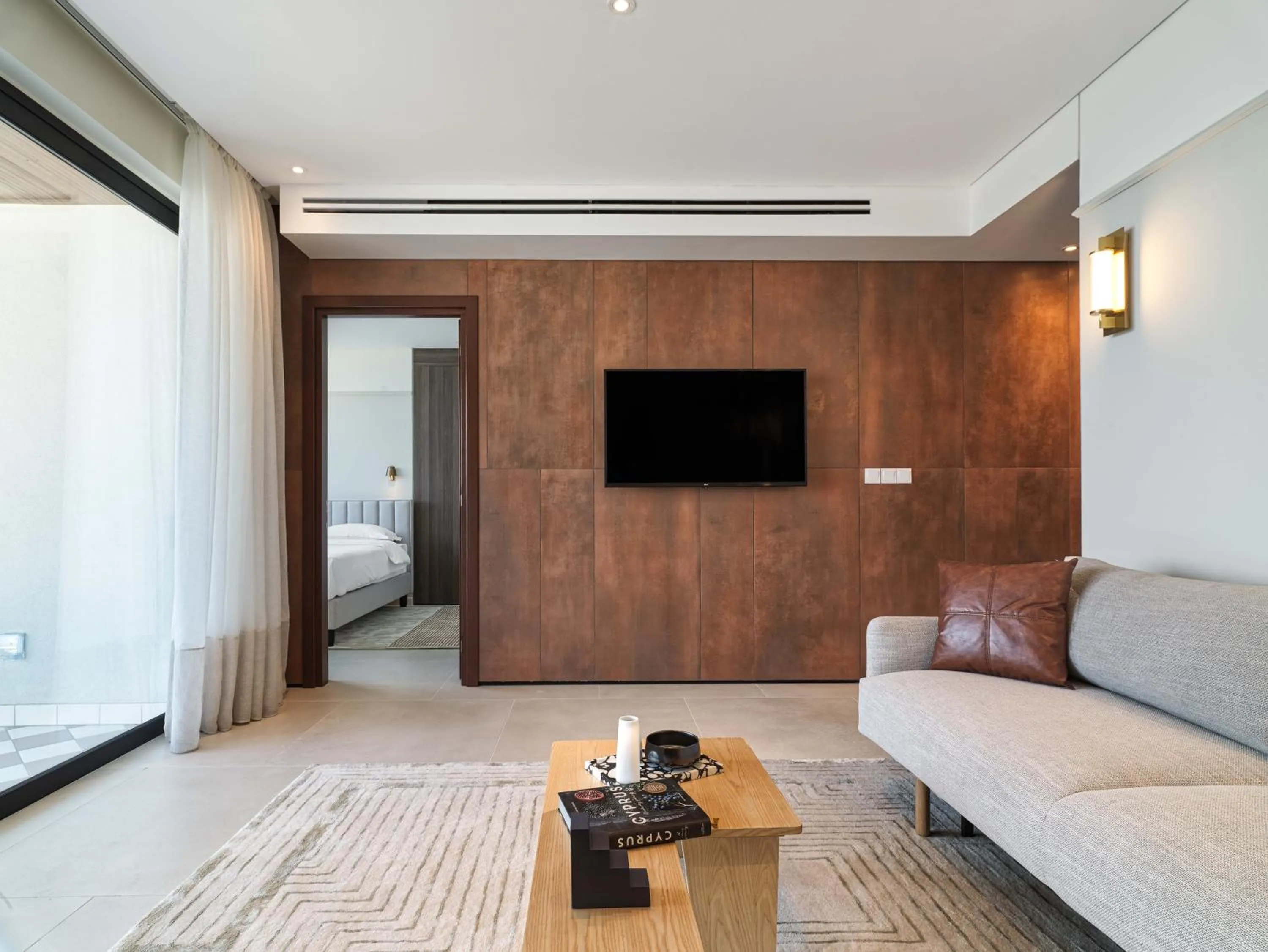 TV and multimedia in LIV Mackenzie Beach Suites Larnaca ADULTS ONLY