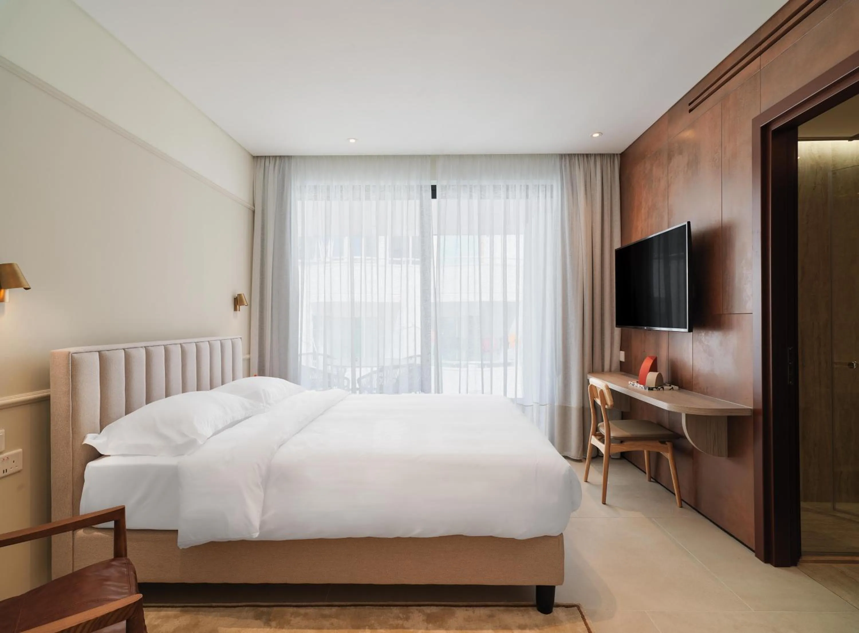 Bedroom, Bed in LIV Mackenzie Beach Suites Larnaca ADULTS ONLY