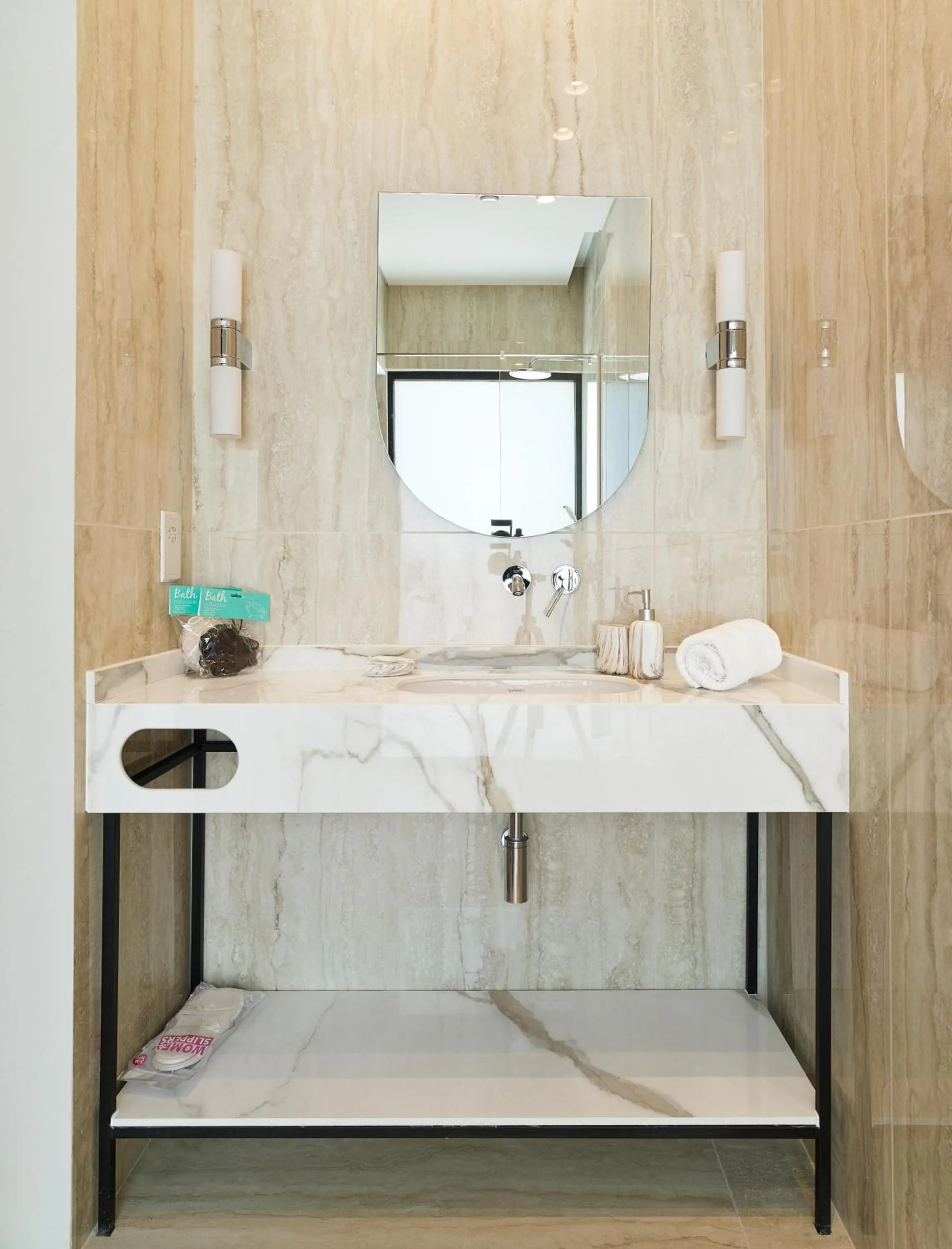 Bathroom in LIV Mackenzie Beach Suites Larnaca ADULTS ONLY