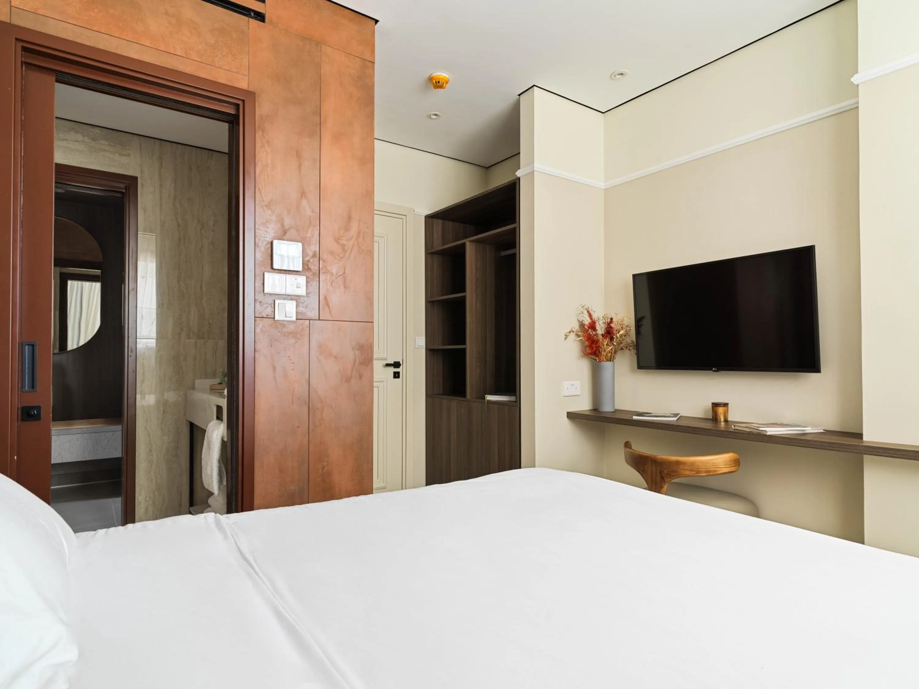 Bed in LIV Mackenzie Beach Suites Larnaca ADULTS ONLY