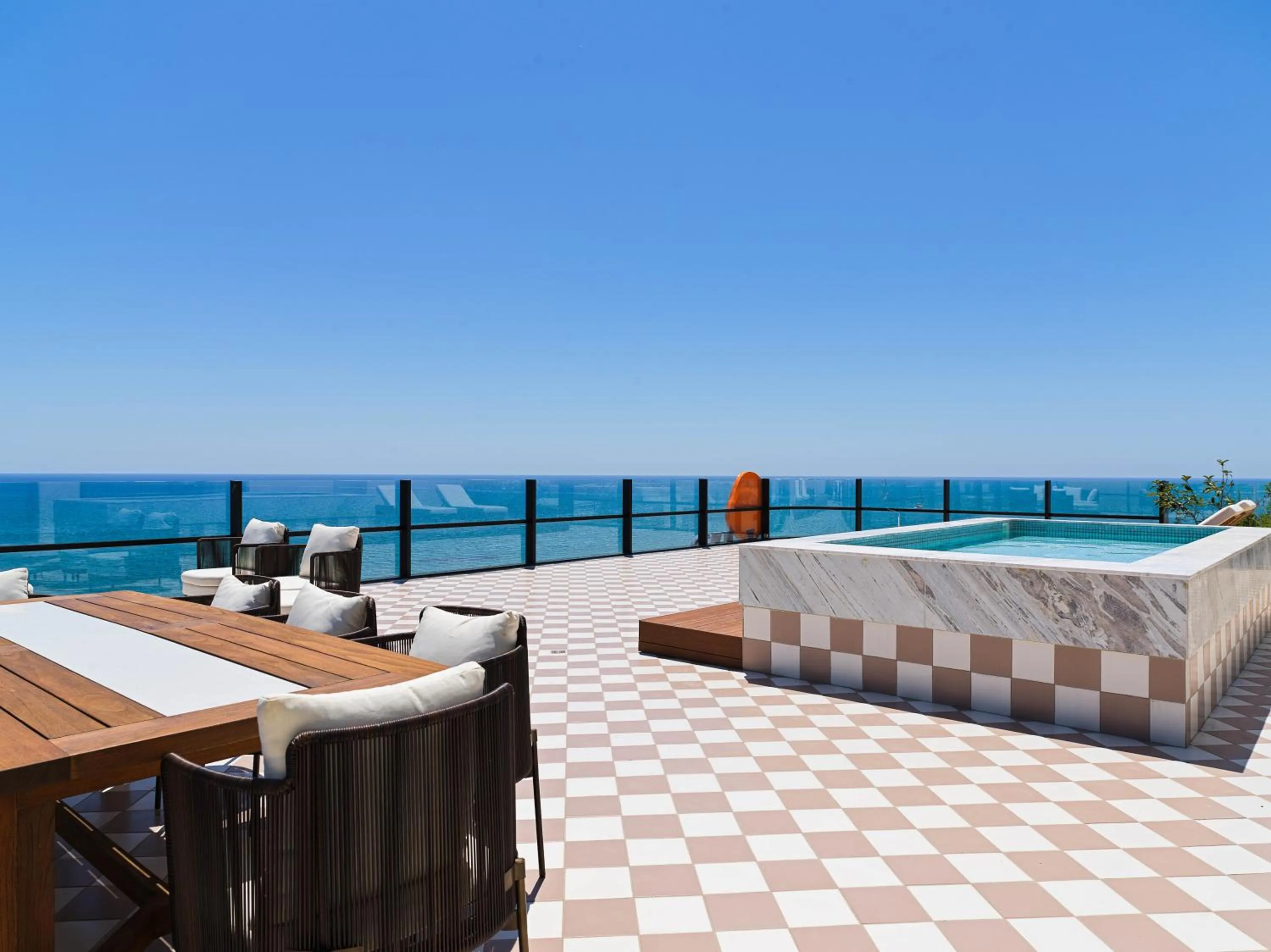 Seating area in LIV Mackenzie Beach Suites Larnaca ADULTS ONLY