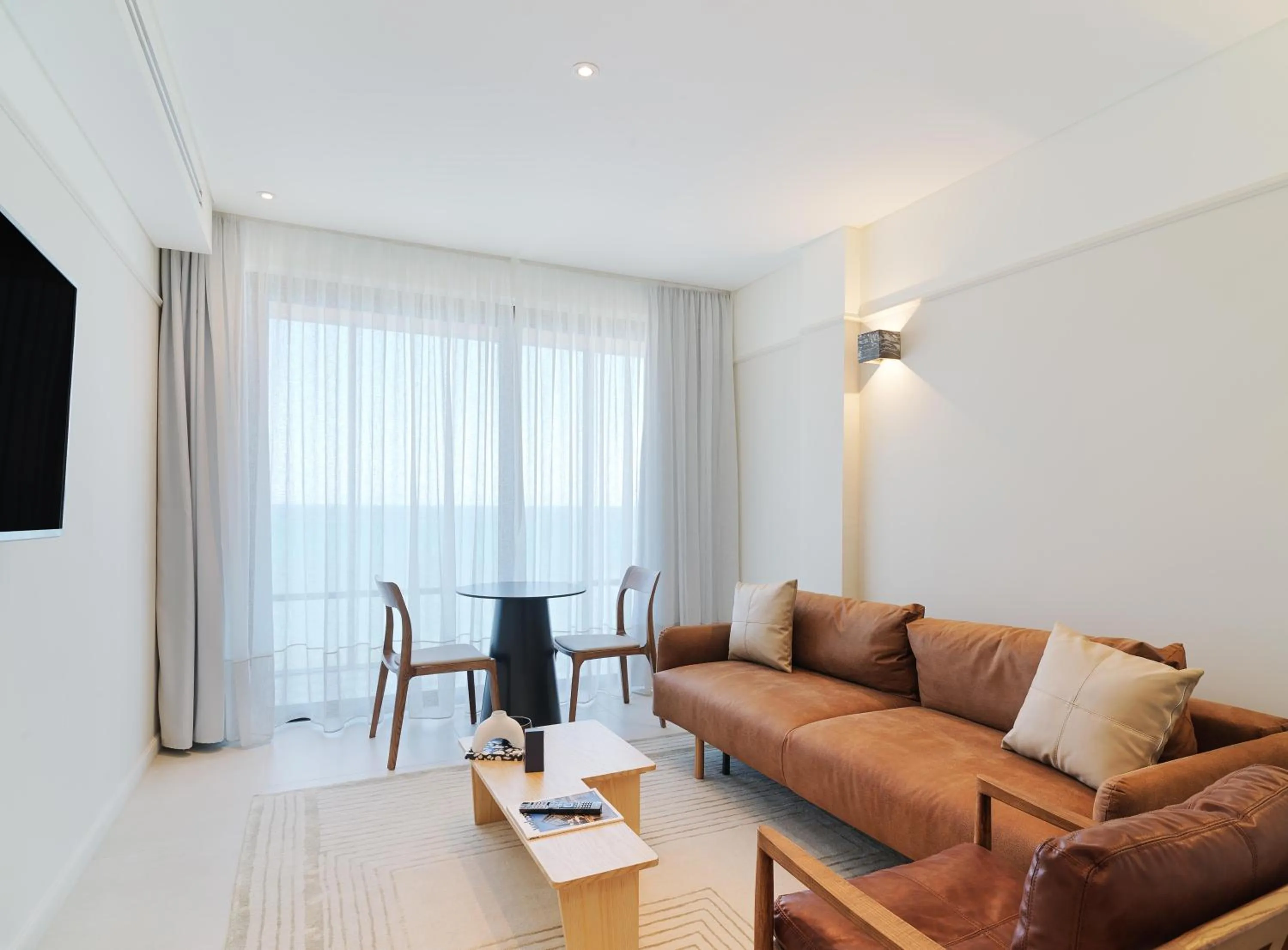 Living room in LIV Mackenzie Beach Suites Larnaca ADULTS ONLY