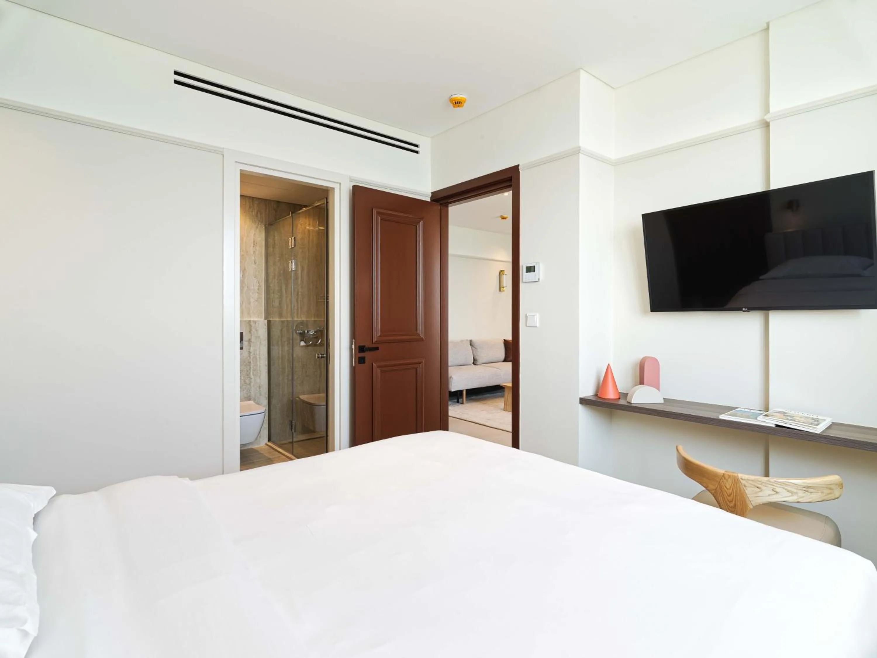 Bed in LIV Mackenzie Beach Suites Larnaca ADULTS ONLY