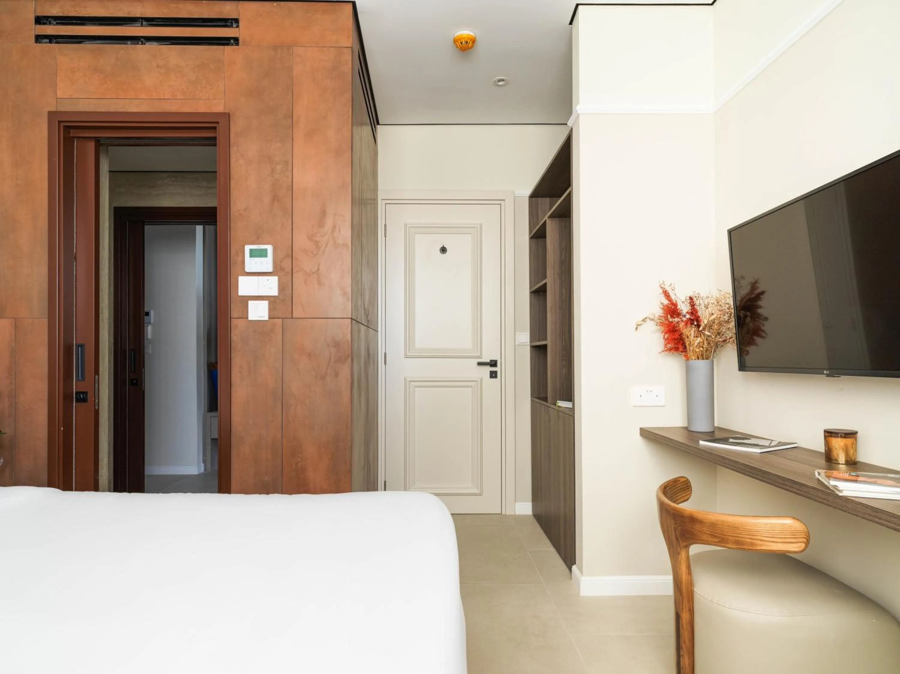 Bed in LIV Mackenzie Beach Suites Larnaca ADULTS ONLY