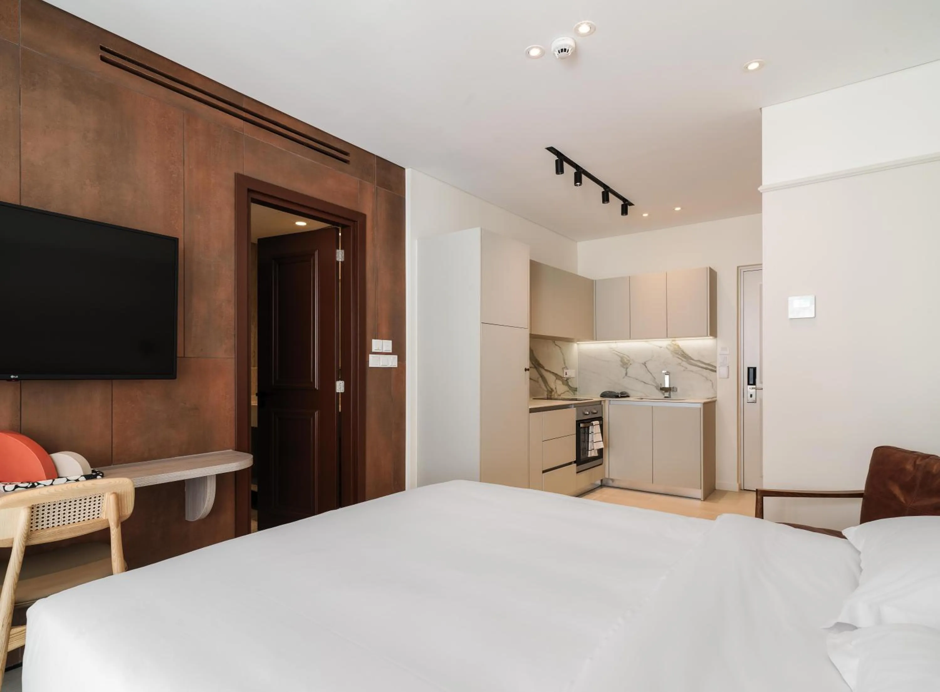 Bed in LIV Mackenzie Beach Suites Larnaca ADULTS ONLY