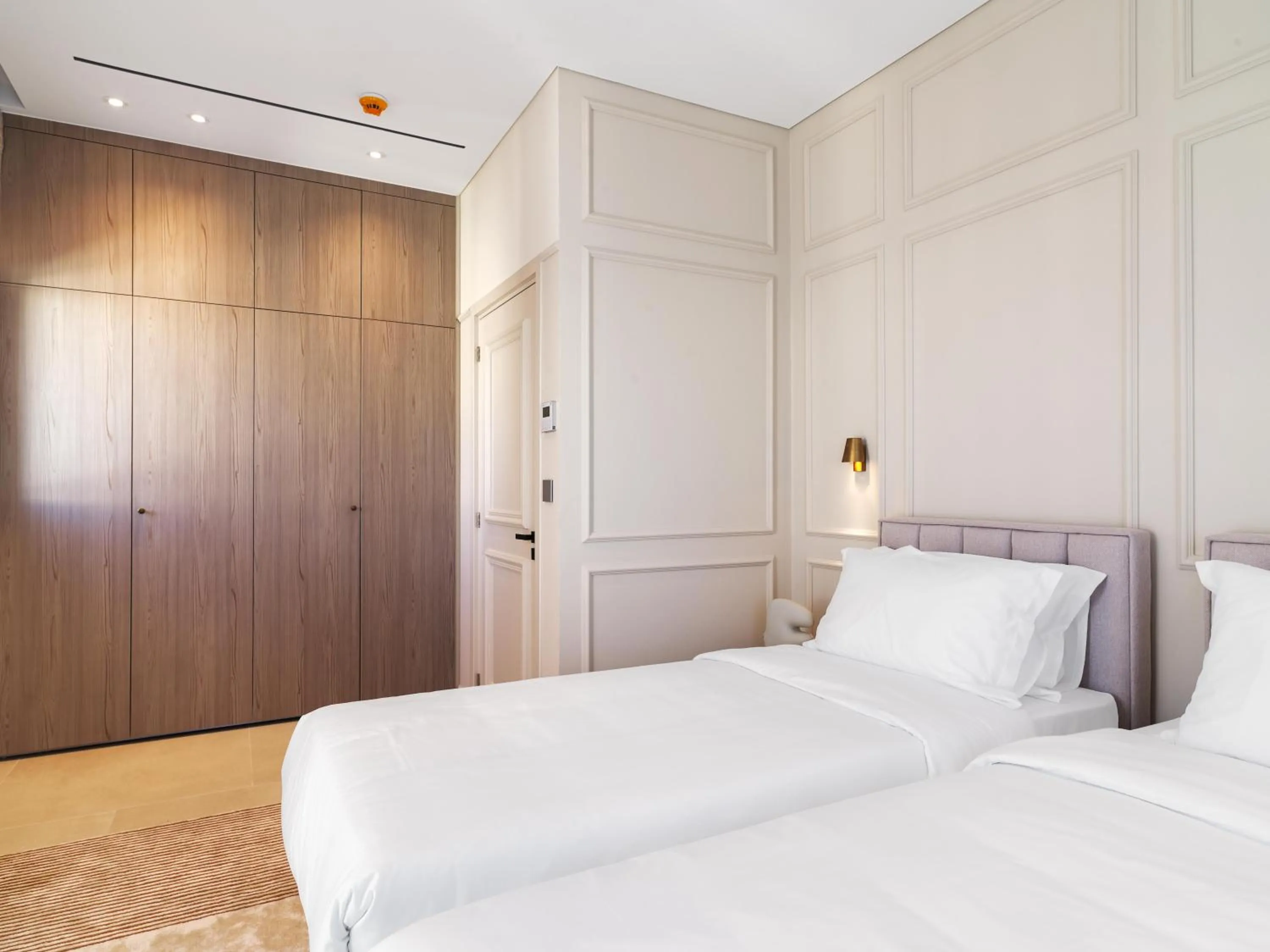 Bedroom, Bed in LIV Mackenzie Beach Suites Larnaca ADULTS ONLY