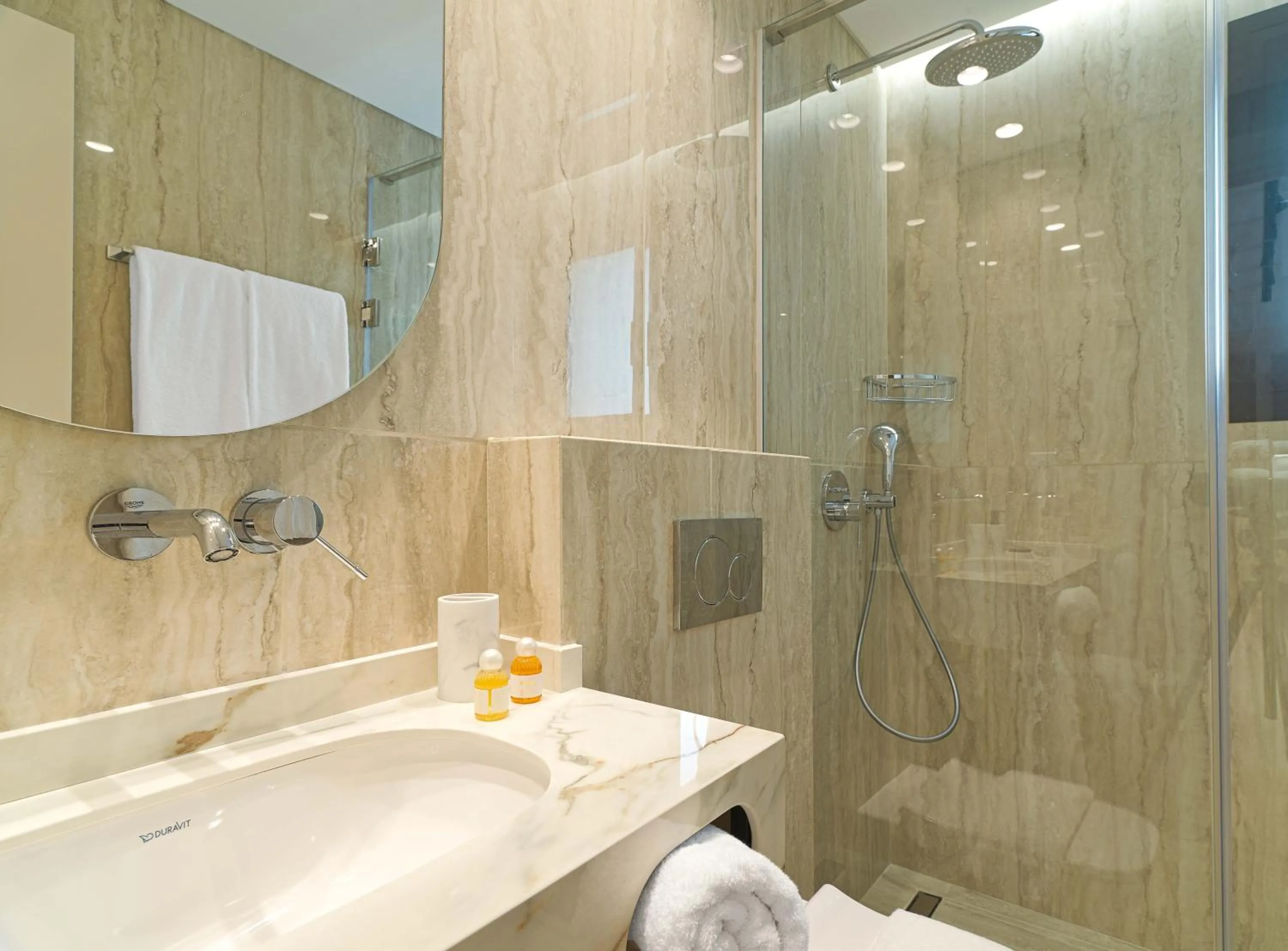 Shower in LIV Mackenzie Beach Suites Larnaca ADULTS ONLY